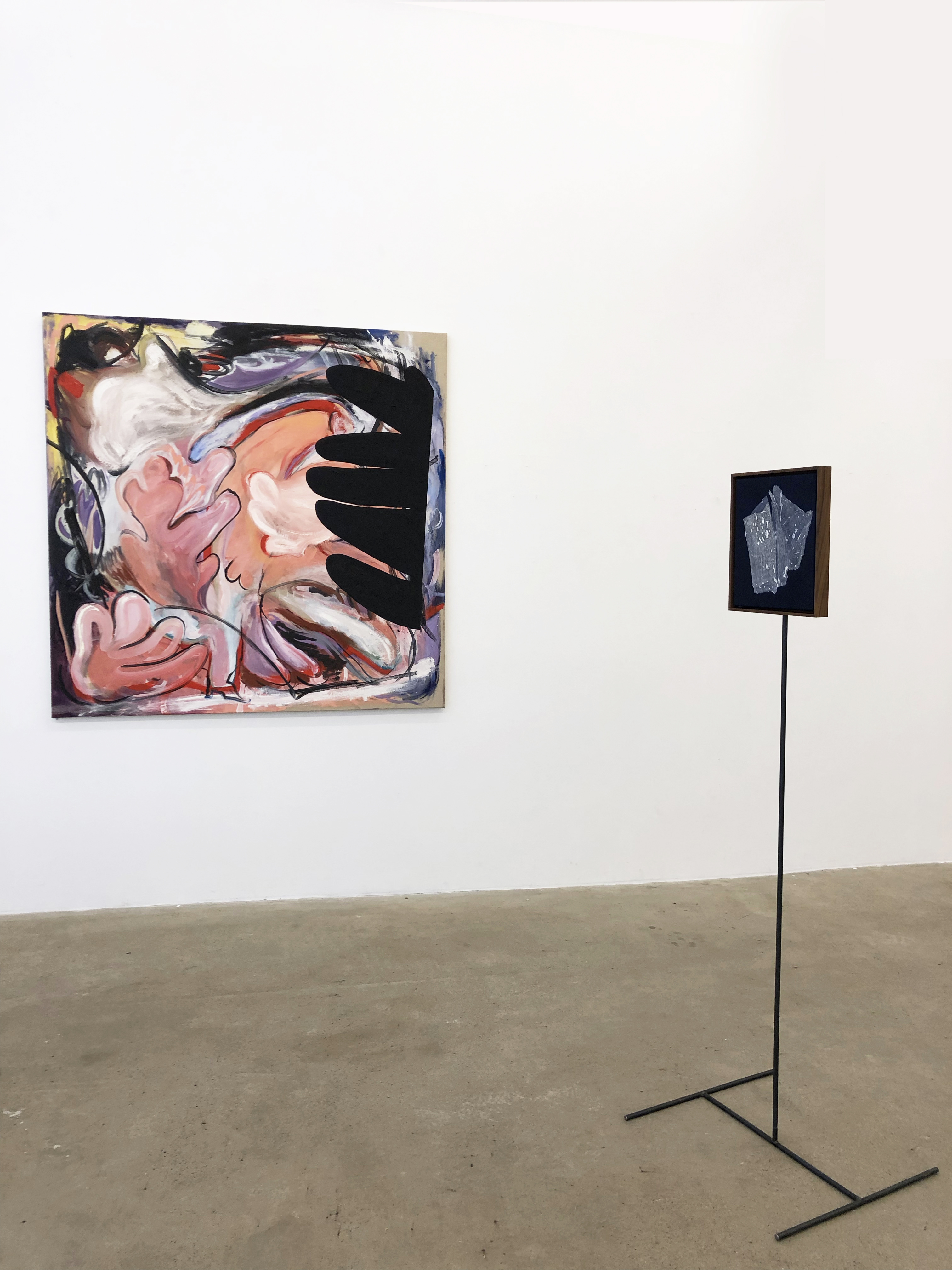 Sigrid Sandström: small painting on steel stands, Jenny Kalliokulju's painting on the wall 2019