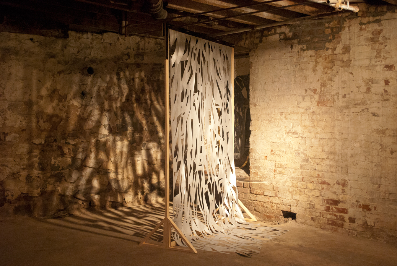 flattened dirge  Ink, graphite, aerosol and copper leaf on paper. Formica, wood and hardware. 2011 - variable dimensions