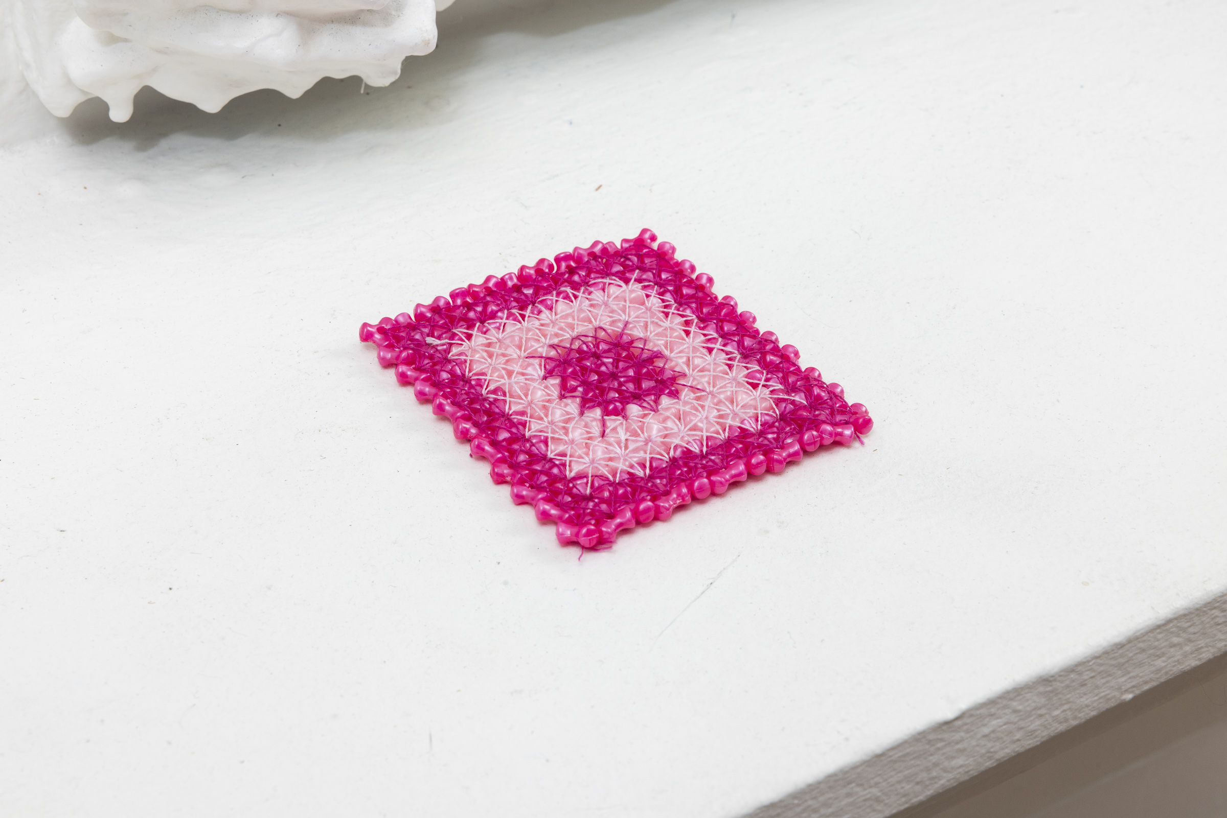 Inside out | Triangular beads, embroidery thread | 3 x 3 in | 2023