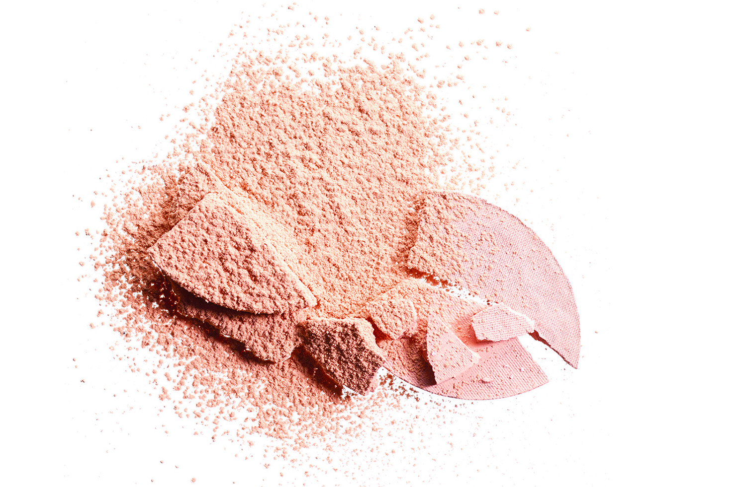 KMA photographer Isabelle Bonjean shoots a close up photograph of smashed pink powdery blush for beauty brand Maybelline