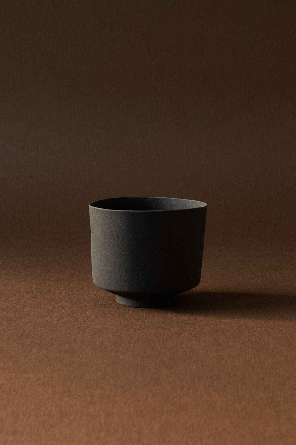 Slip casted cups and bowls - Blackbrown — joel sandelius