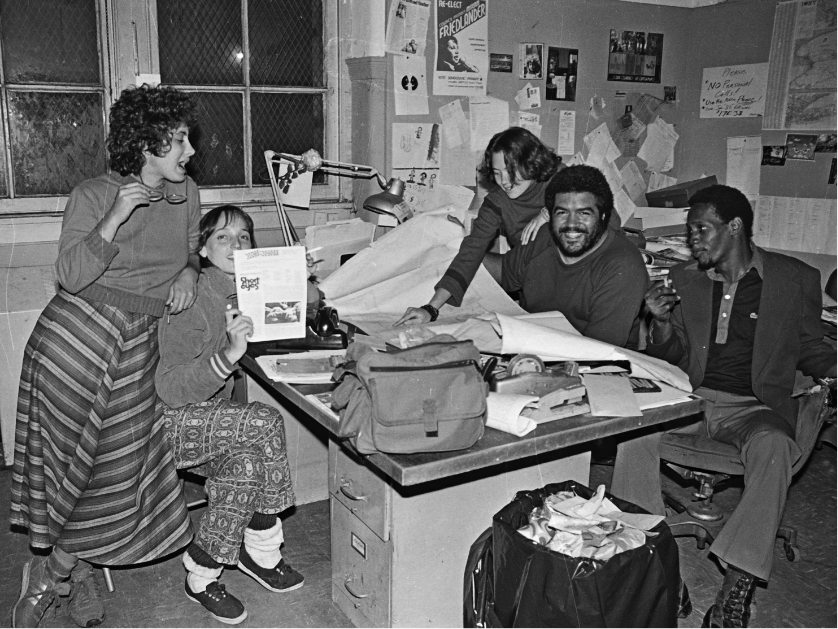 CHARAS office within El Bohio Community Center with Emily Rubin (Bucket Theater), Doris Kornish (Films CHARAS), Cynthia, Chino García, and Slima Williams, 1981.  Photograph by Marlis Momber.