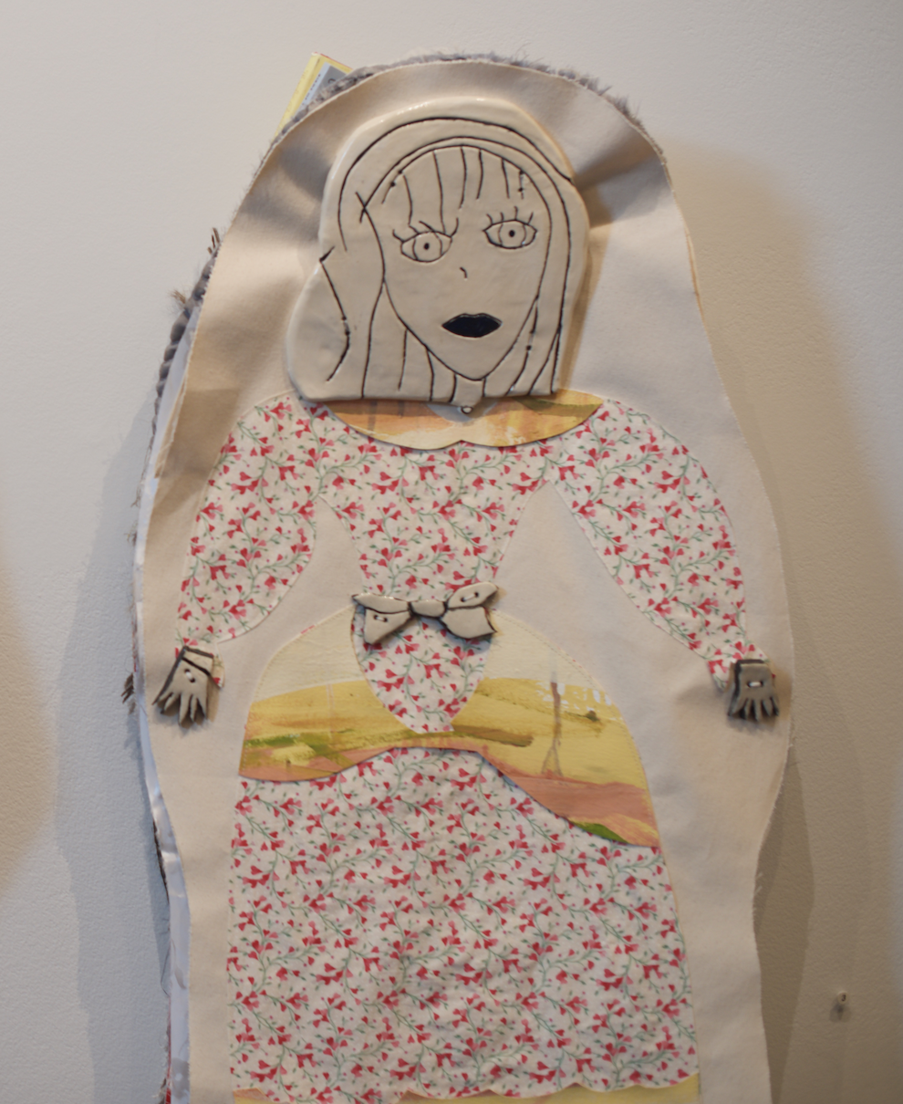 Jennifer 2024 ceramic, salvaged fabrics, found artworks, books and VHS tapes $850