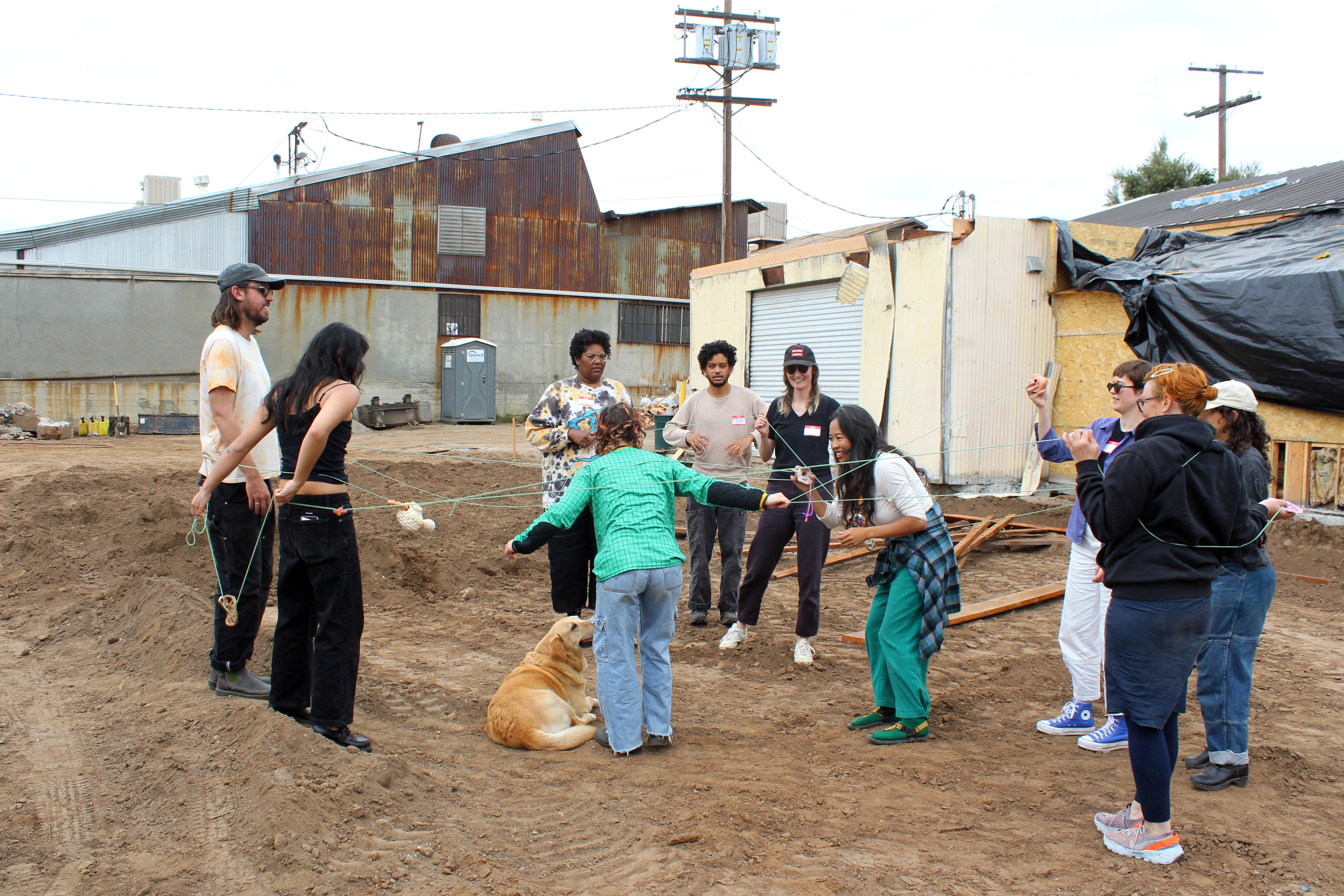 The Infinite Worm, May 26th 2024, worm school facilitating a reading discussion and string figure games at The Infinite School in Los Angeles, Image courtesy of worm school and The Infinite School.