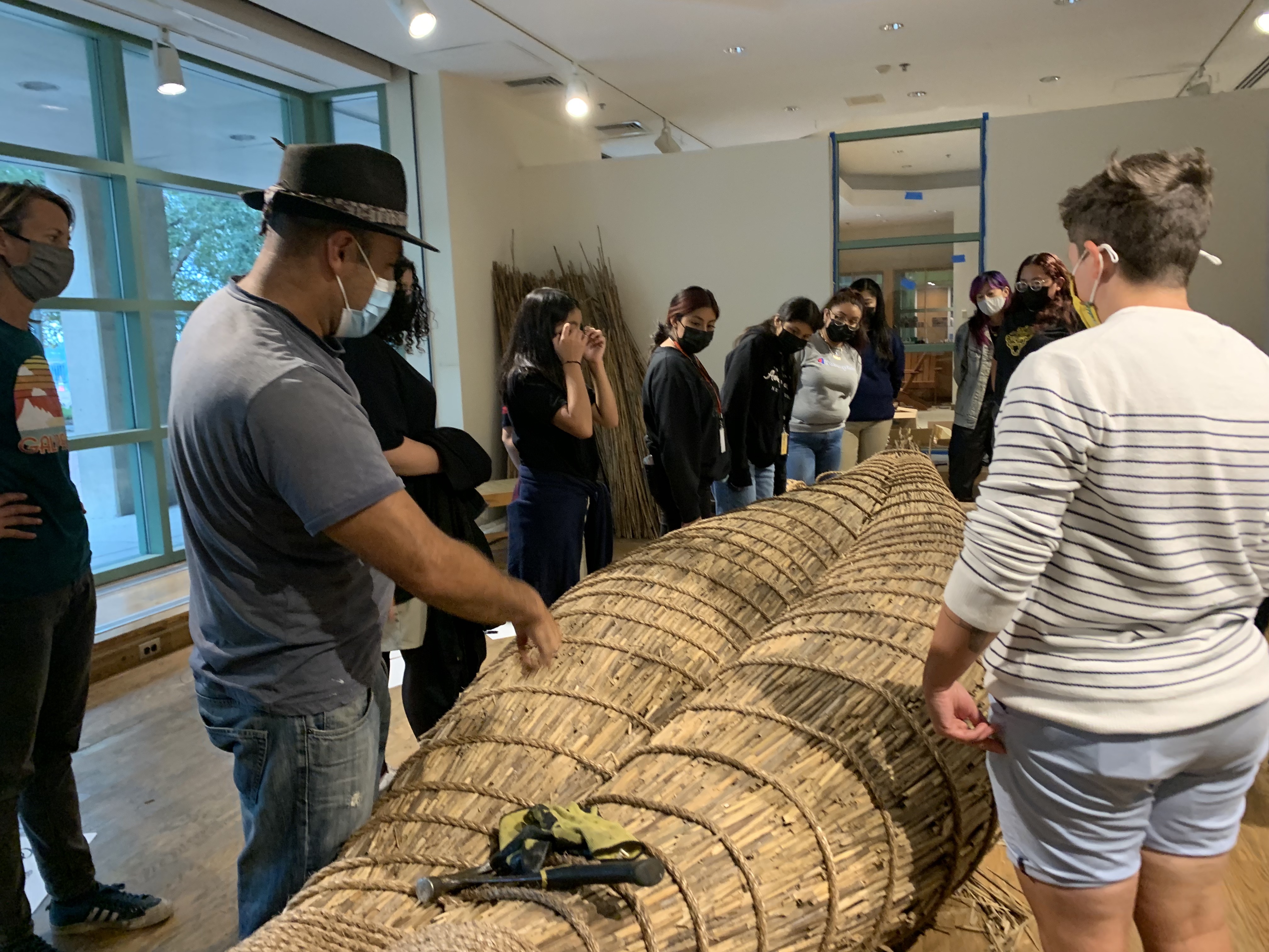 Aymar talks to youth from Juntos during a visit