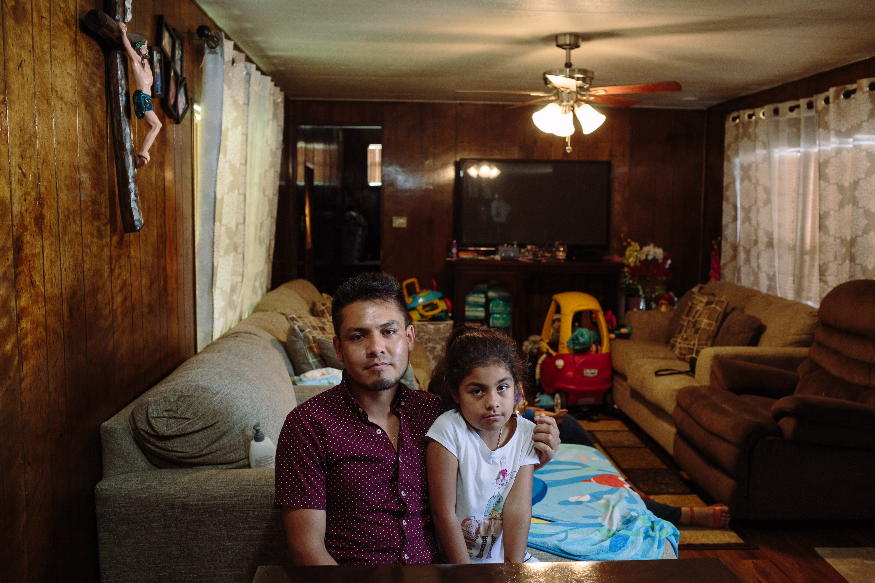 Luis Bautista-Martinez with his niece, Yemaya, at their home in Morristown, Tenn. after returning home from three months in an ICE detention facility.