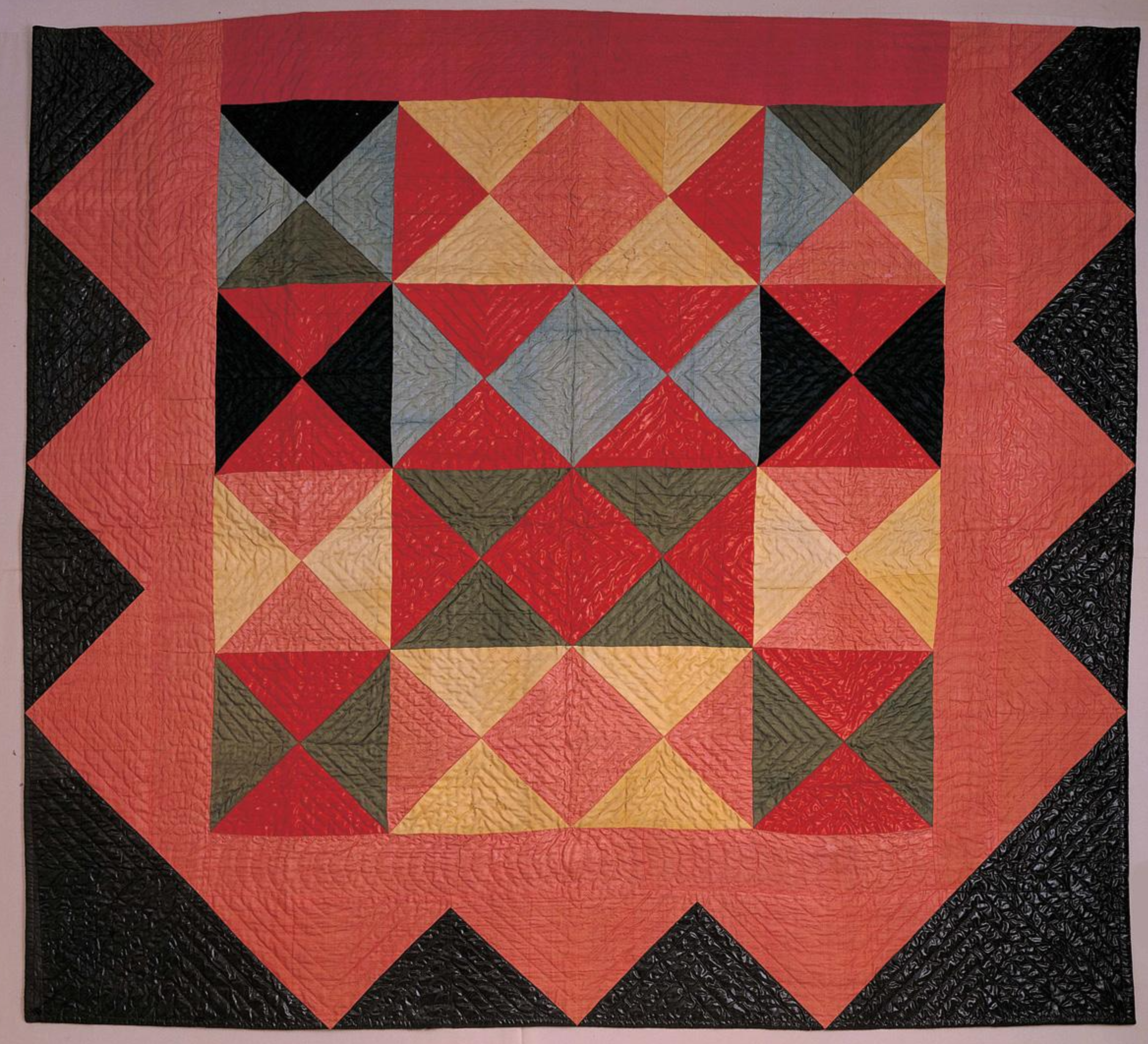 http://collection.folkartmuseum.org/objects/1261/harlequin-medallion-quilt?ctx=16b158d1-f977-4f2e-a8e1-3d9cde2216e6&idx=146