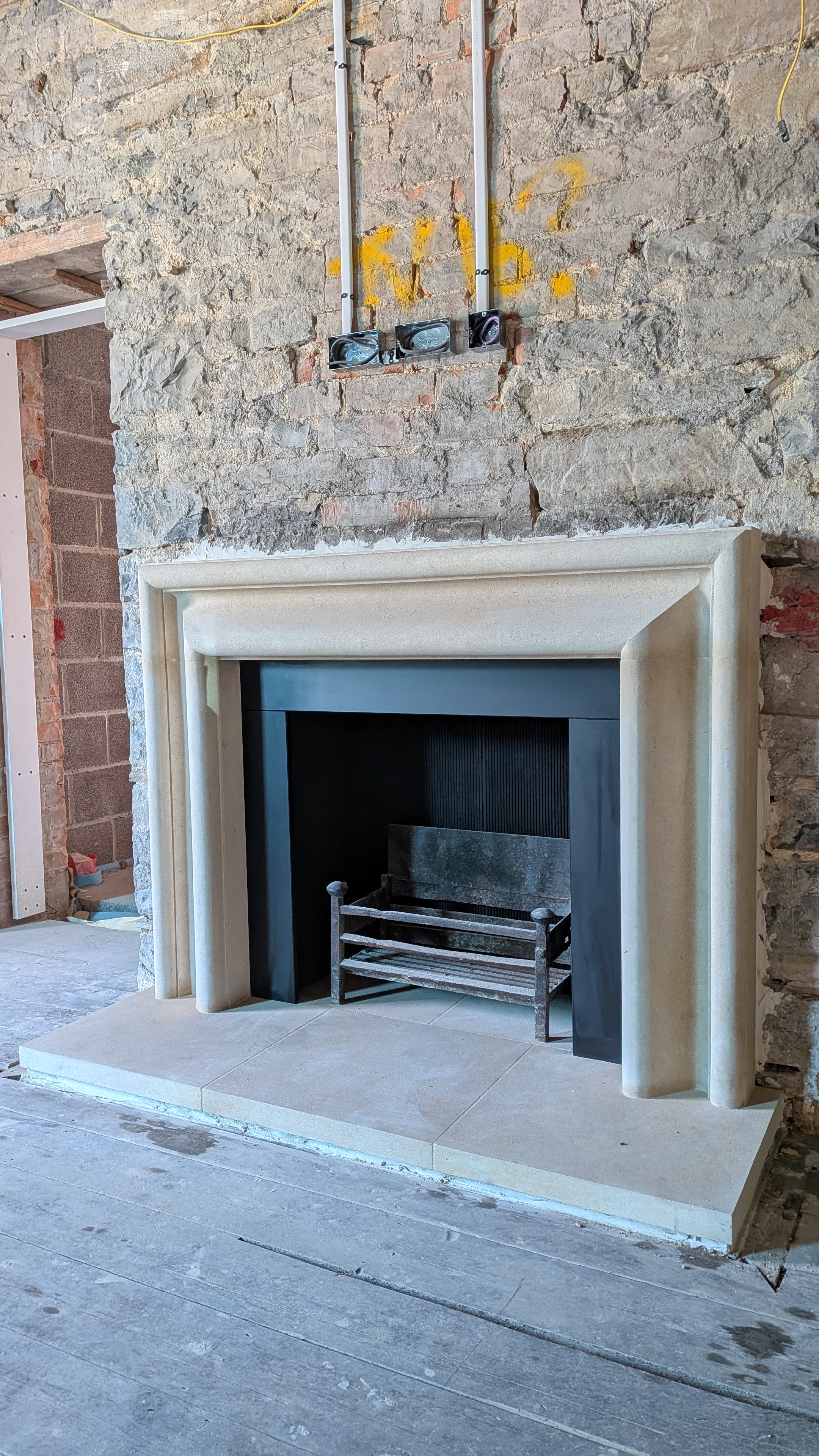 Hampstead Bolection in Bath stone with slate slips