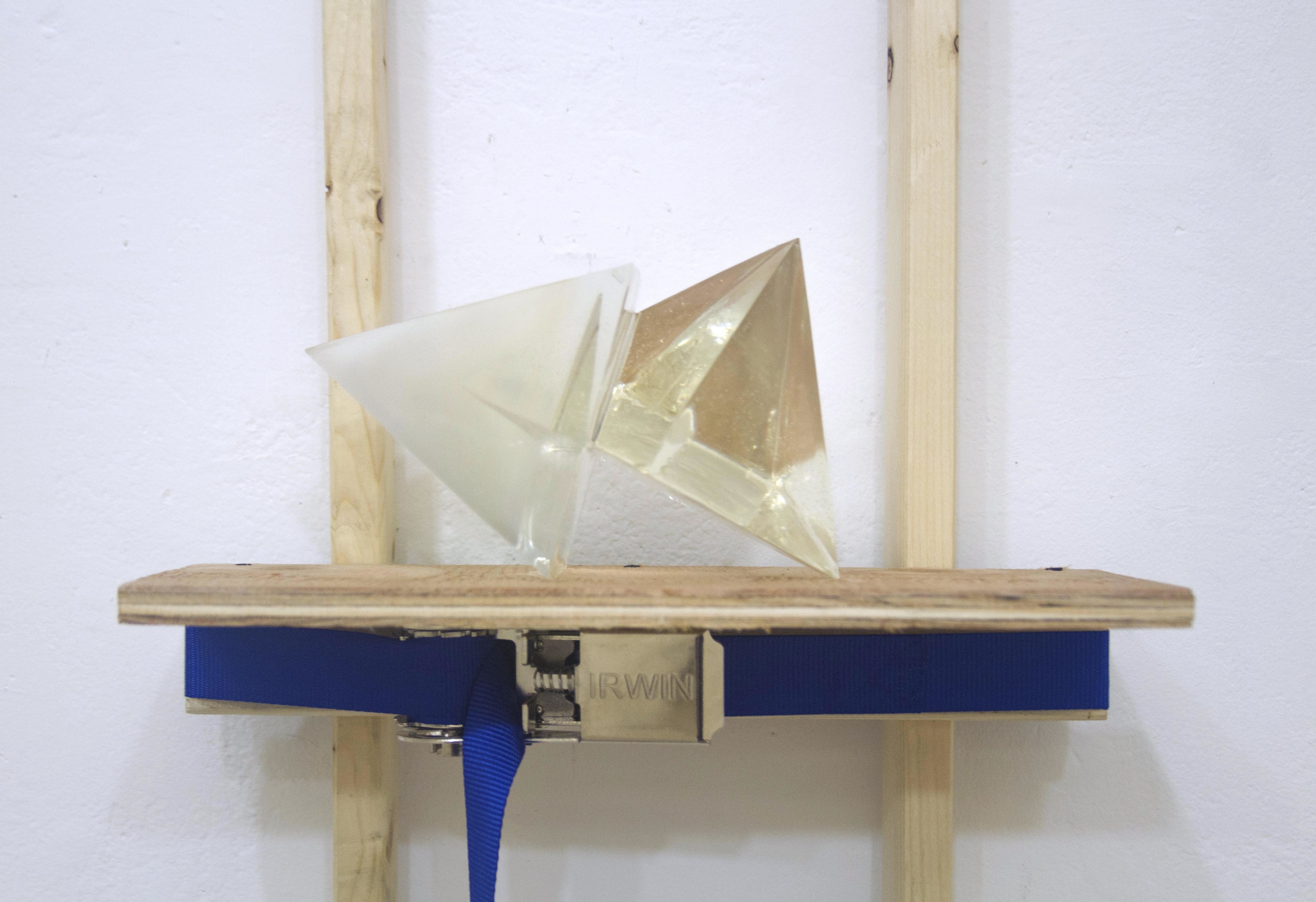 Detail of On Which a Bold Gesture Is Held, 2018, 48”x 24”x 4”. Wood, screws, band clamp, epoxy resin