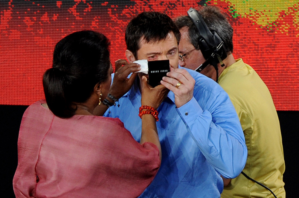 Australian actor Hugh Jackman has his eye seen to by Oprah Winfrey after injuring his eye in an accident absailing from a sail of the Sydney Opera House during the second of the Oprah Winfrey show 2010 