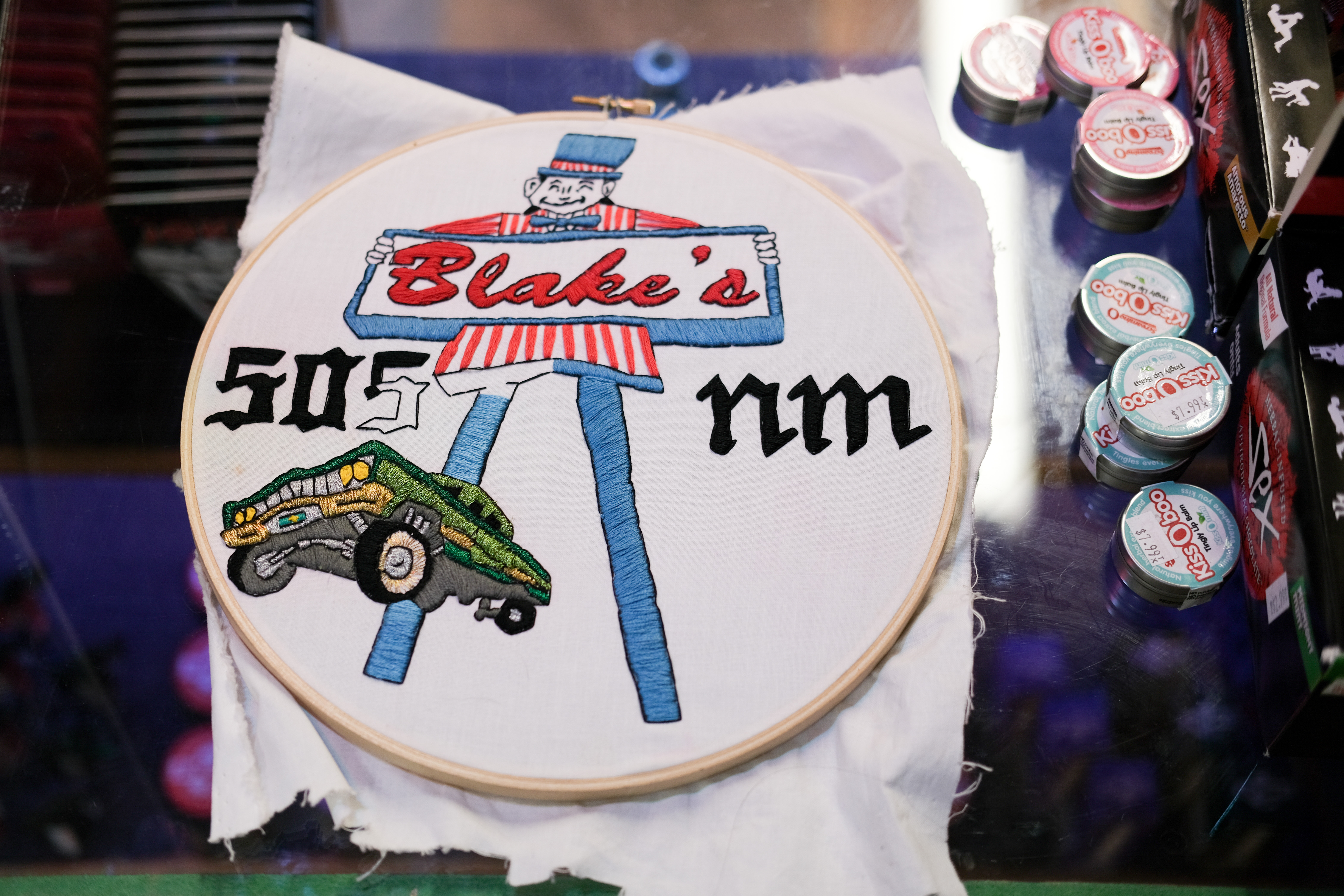 Embroidery keeps Aliyah busy while at work in a sex shop. Blake's is a staple burger restaurant in her hometown of Santa Fe, NM.