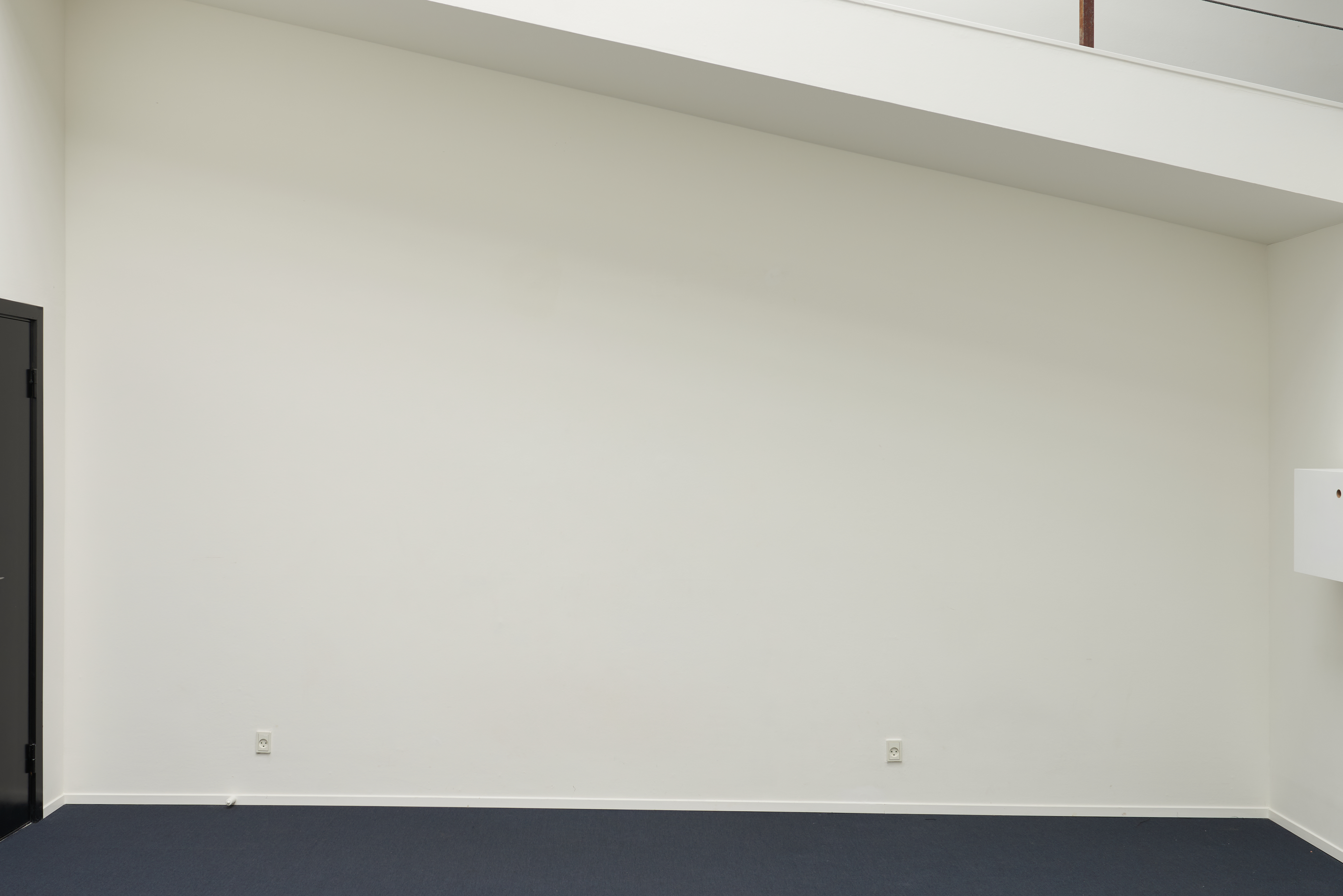 Cecilia Bjartmar Hylta "Untitled" 2018/2020  vibrator, wall, dimensions variable (installation)