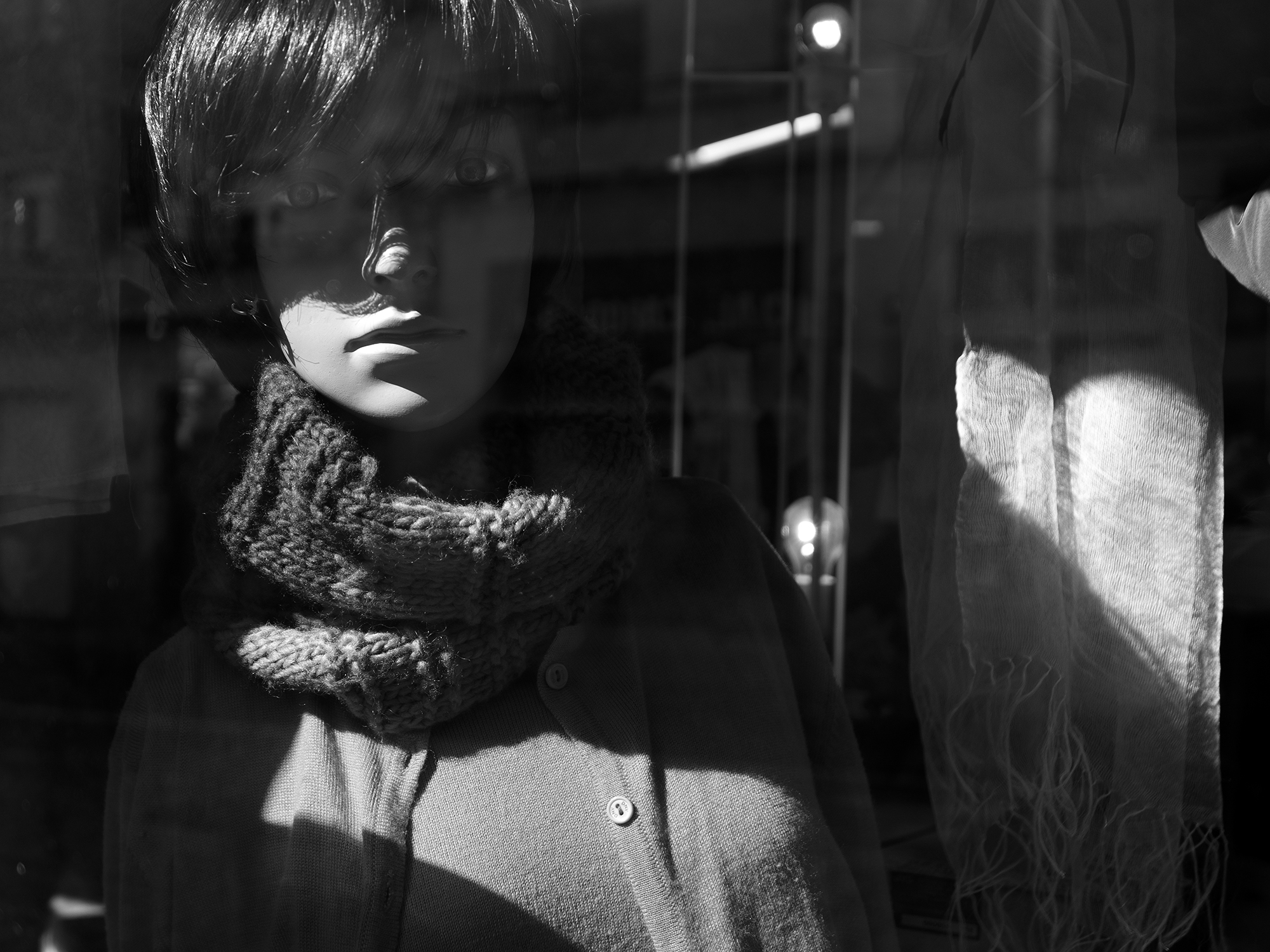 Melancholic brunette mannequin Pamplona, Spain, 2023photography, single, bw
