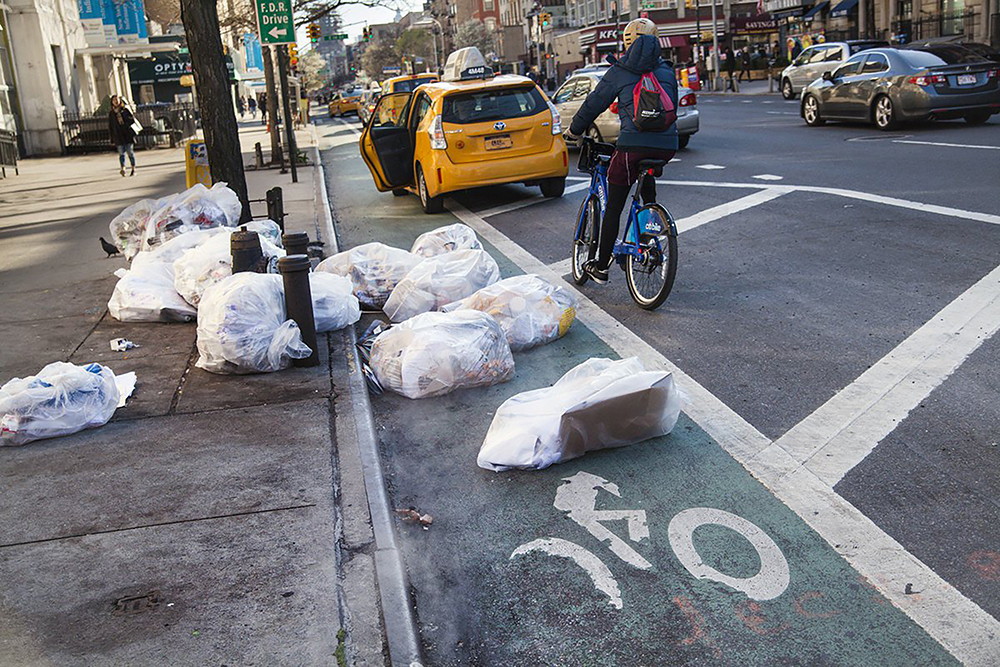 16 Before: Commercial waste waiting for pickup by private carters