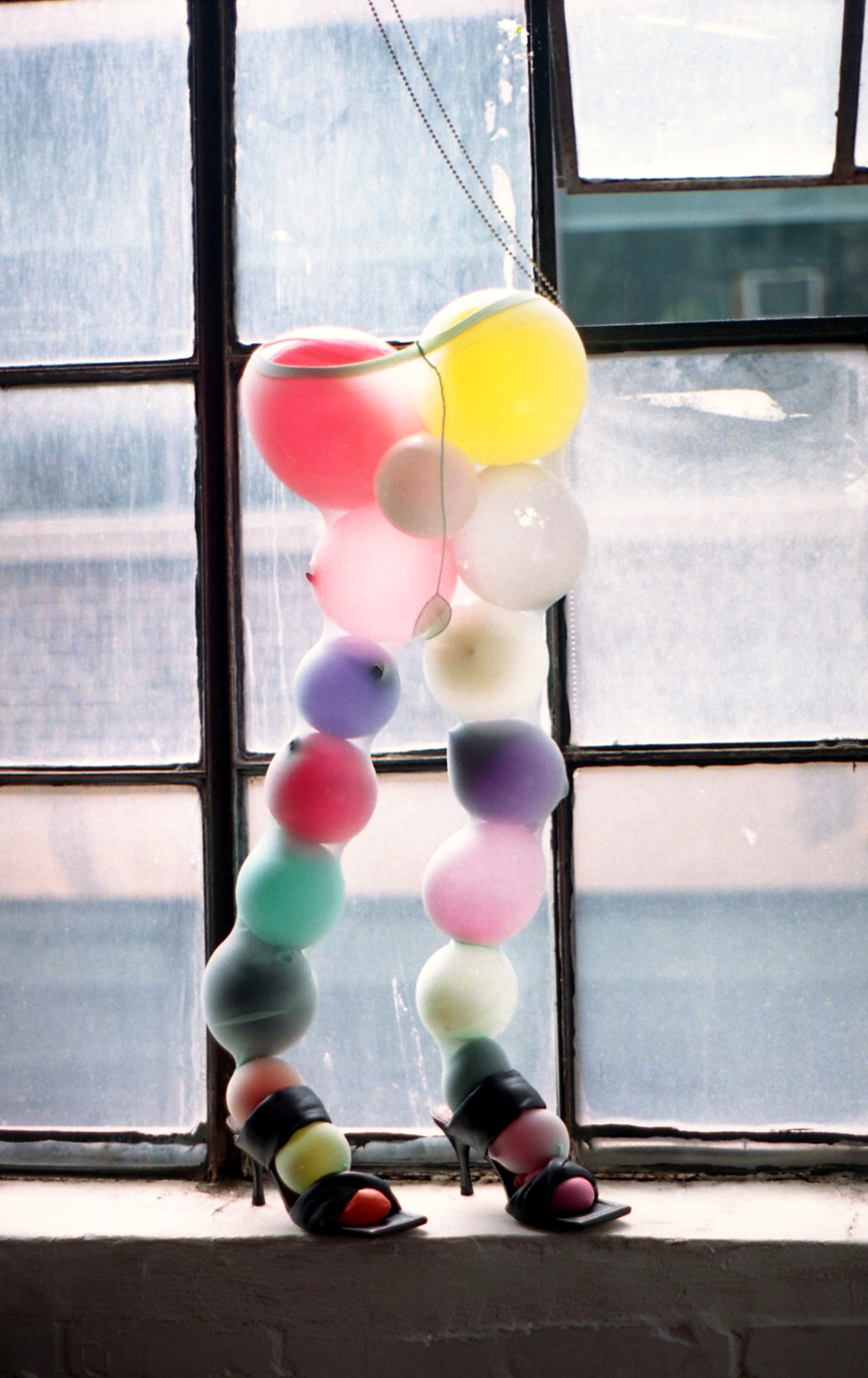 Colourful balloons stuffed in tights