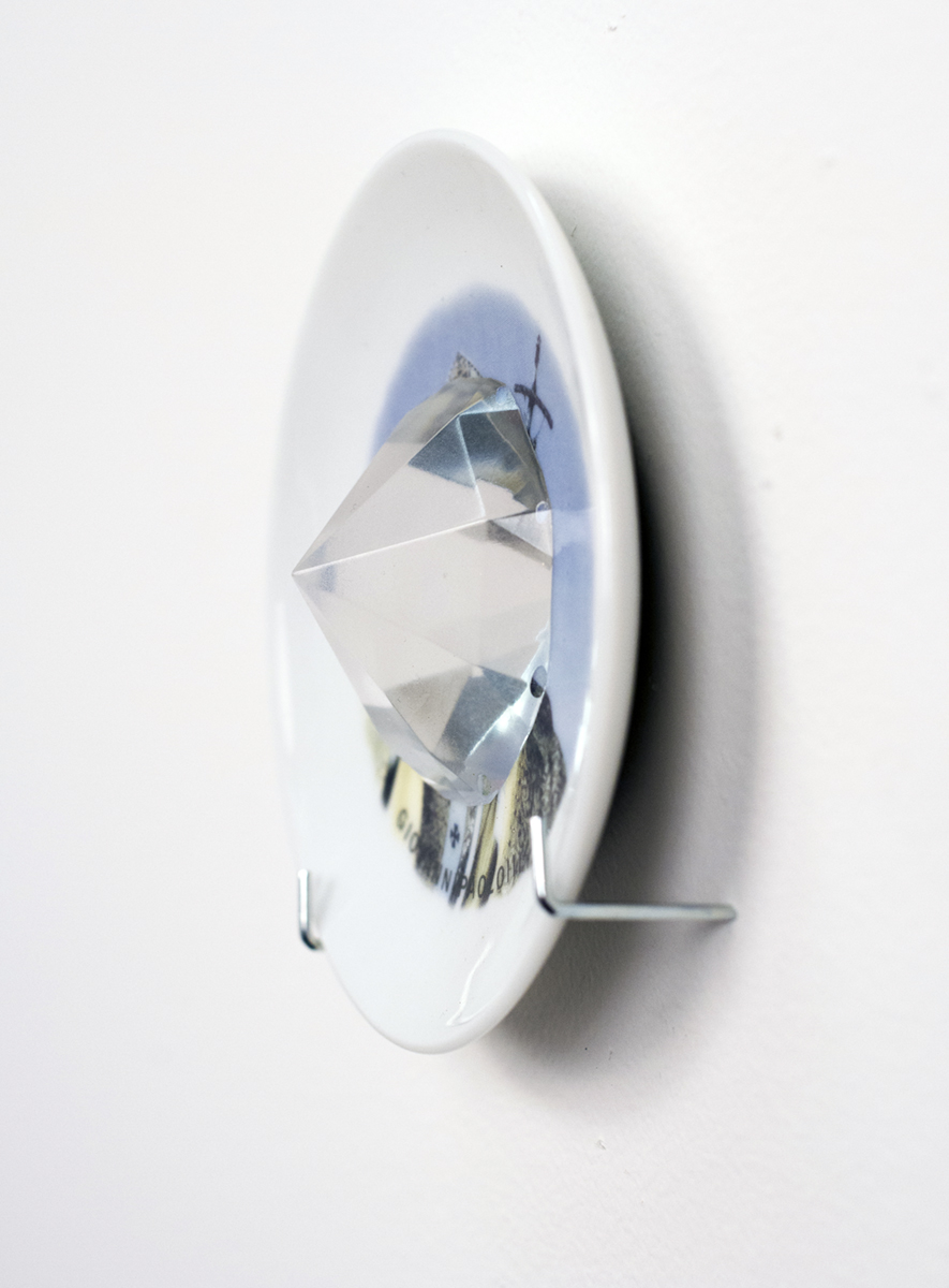 Side view of Papa (The Way You Look), 2019, 3"x3"x1.25". Commemorative plate, epoxy resin