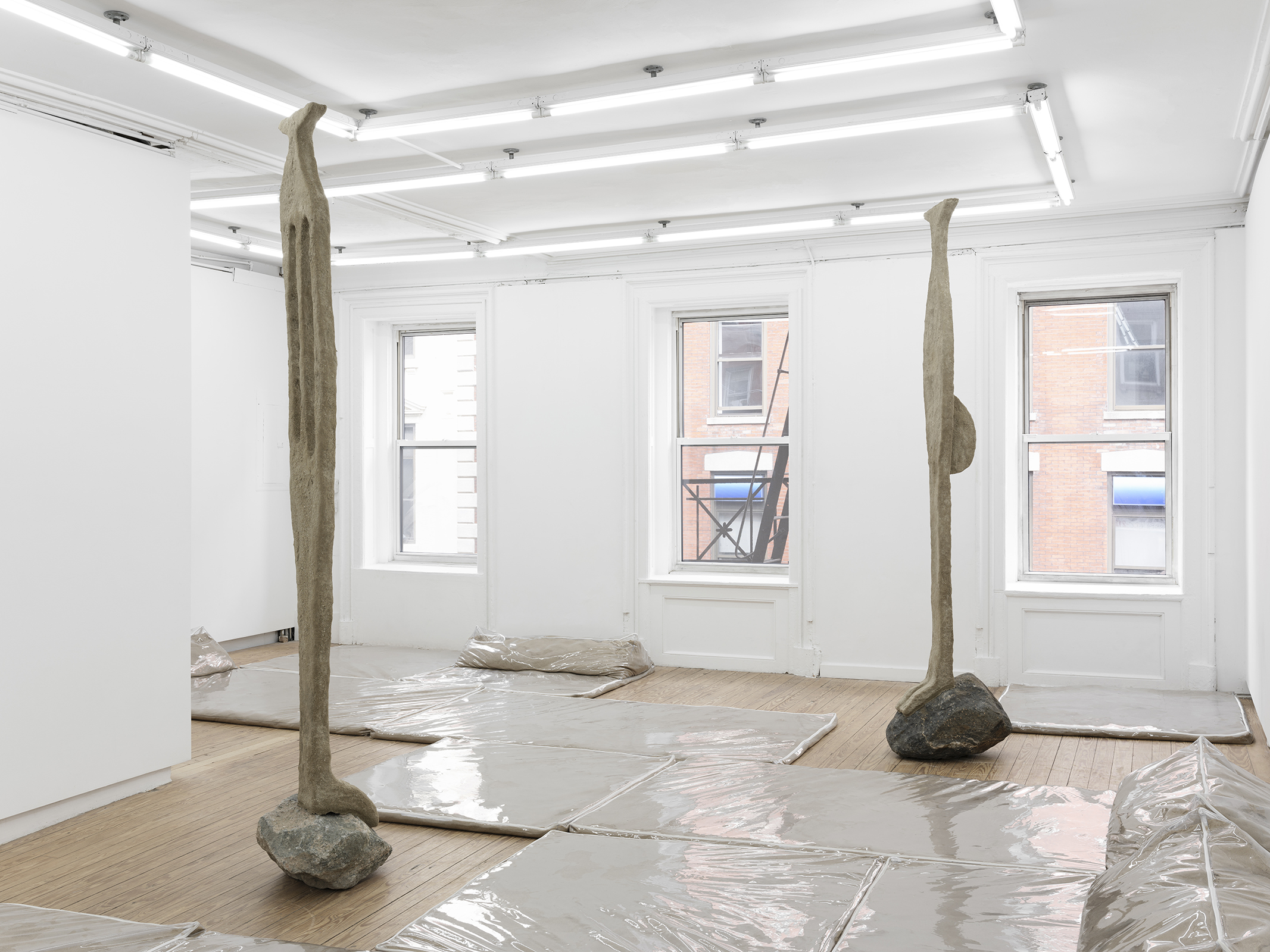 Lone And Level, 2021, vinyl, sand, polymer, burlap, steel, rock