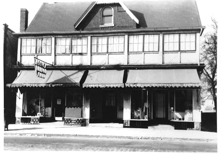 Post office, hairdressing studio, clothing shop in 1930s