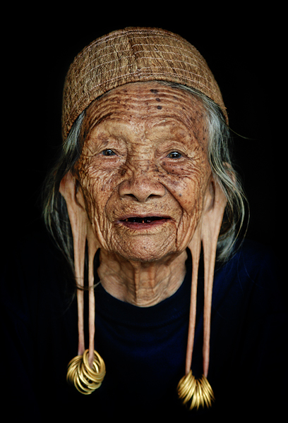 TUWING TAHKANG - Old woman from Dayak Kenyah tribe, East Borneo (Kalimantan), Indonesia