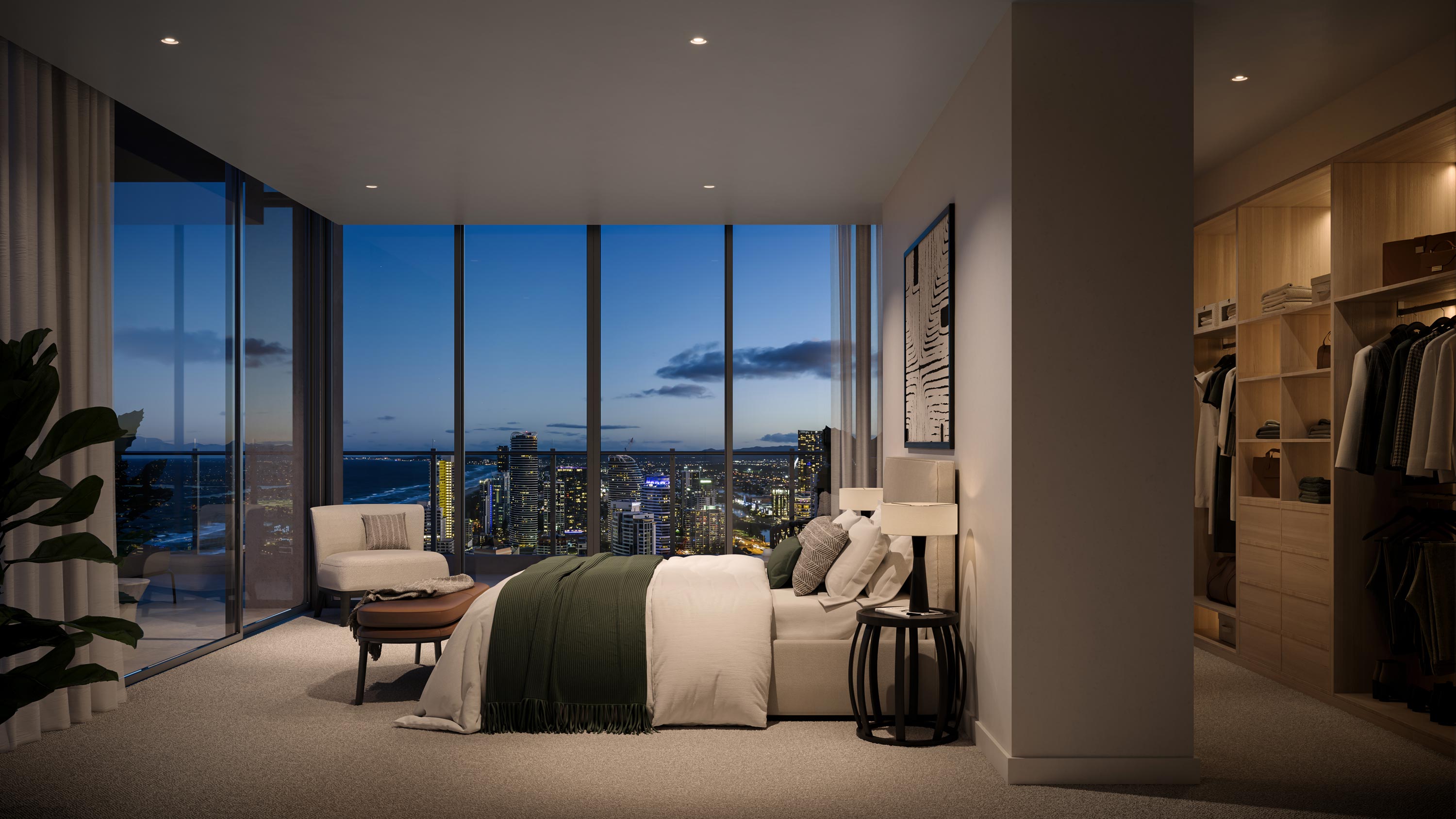 A nighttime cityscape seen from a bedroom window.