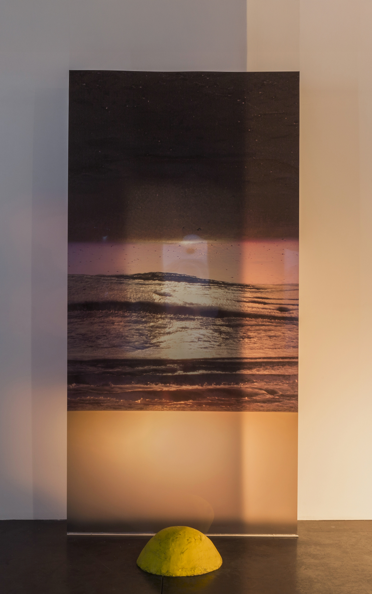 Distorted Sun, 2018, Digital Print on a Transparency and Plasticine, 285x140 cm, 60x60x35 cm