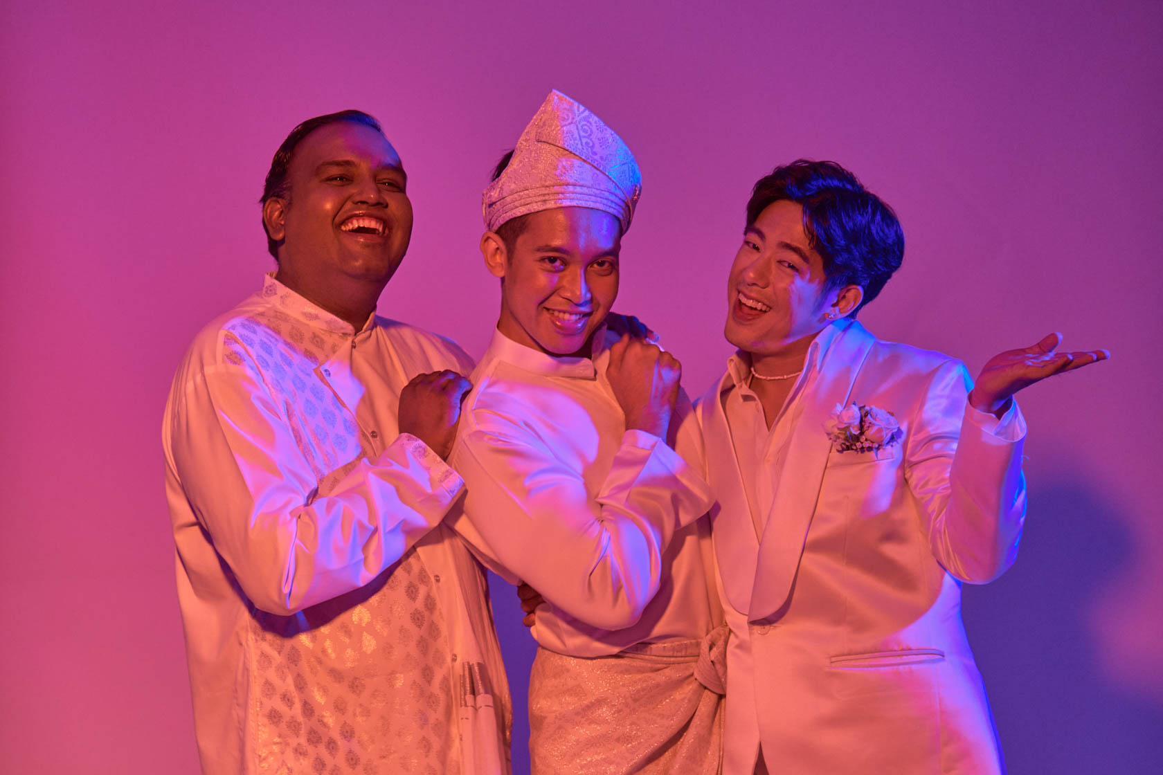 The same three men, hamming it up.