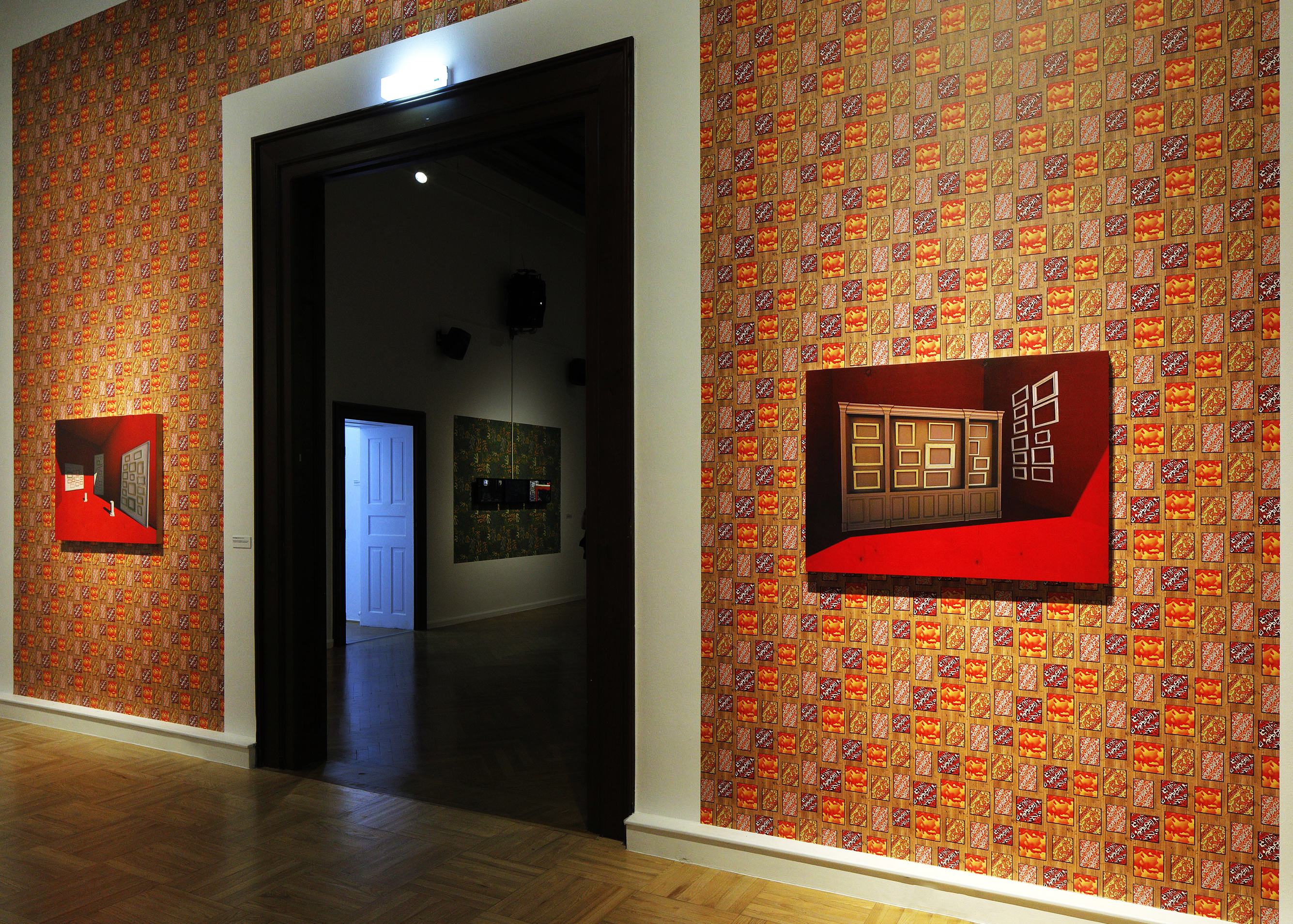 Hermitage 1.0 and 2.0 (2021/2022), Red Bombay India ink and pigment on maple panel, made from  file produced using Maya 3D animation software, both mounted on Digital Combines custom web based augmented reality wallpaper; in adjoining room, The Ruins (2020), 10-minute loop made using  Maya 3D an-mation software, Adobe Premier Pro, Adobe After Effects and Adobe Photoshop,  mounted on Digital Combines augmented-reality wallpaper.