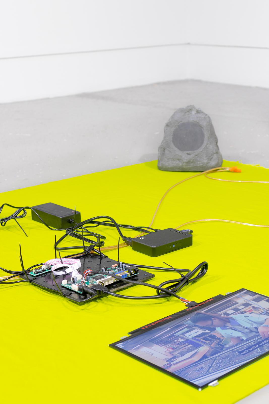 Thermochromic workflow, 2020, heat-sensitive fabric, led screens, led controllers, media players, flash drives, amplifiers, faux rock speakers, cables, each approximately 44 x 77 in. (112 x 196 cm)