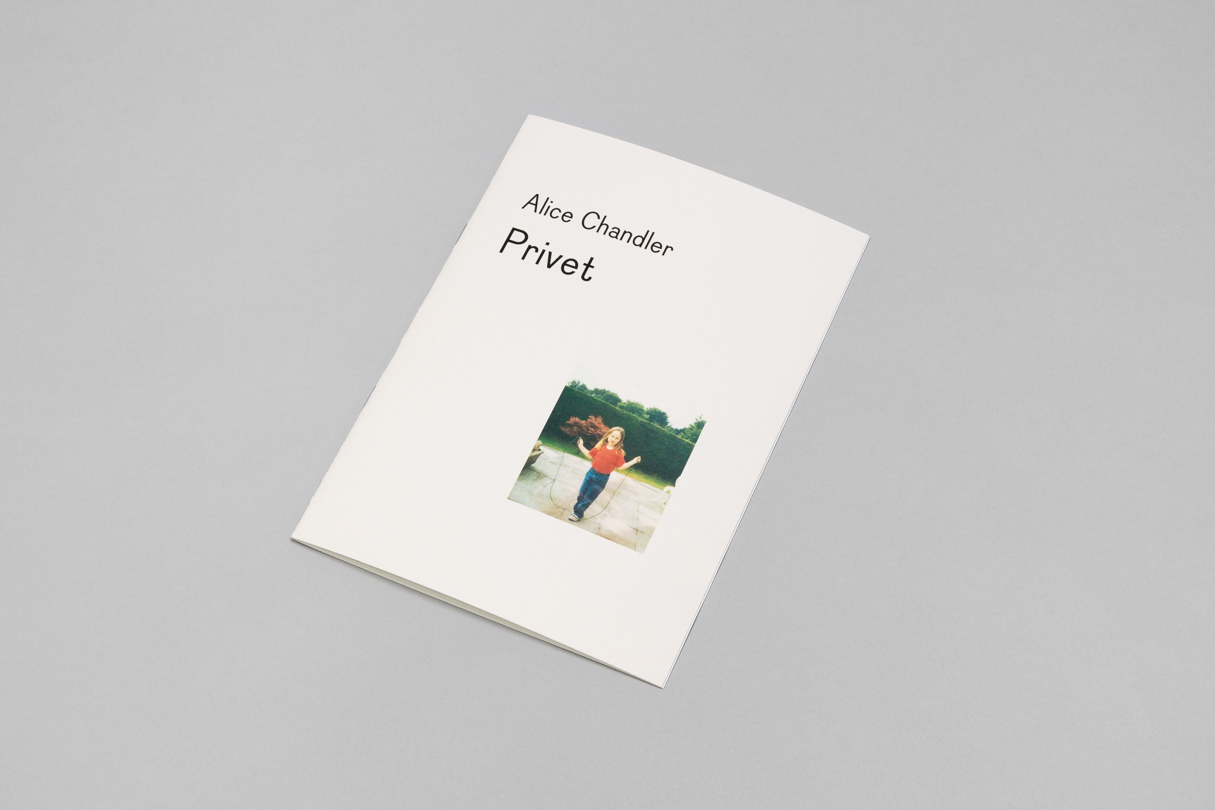 The front cover of Alice Chandler: Privet booklet, which includes a picture of a young girl holding a skipping rope in front of a privet hedge.