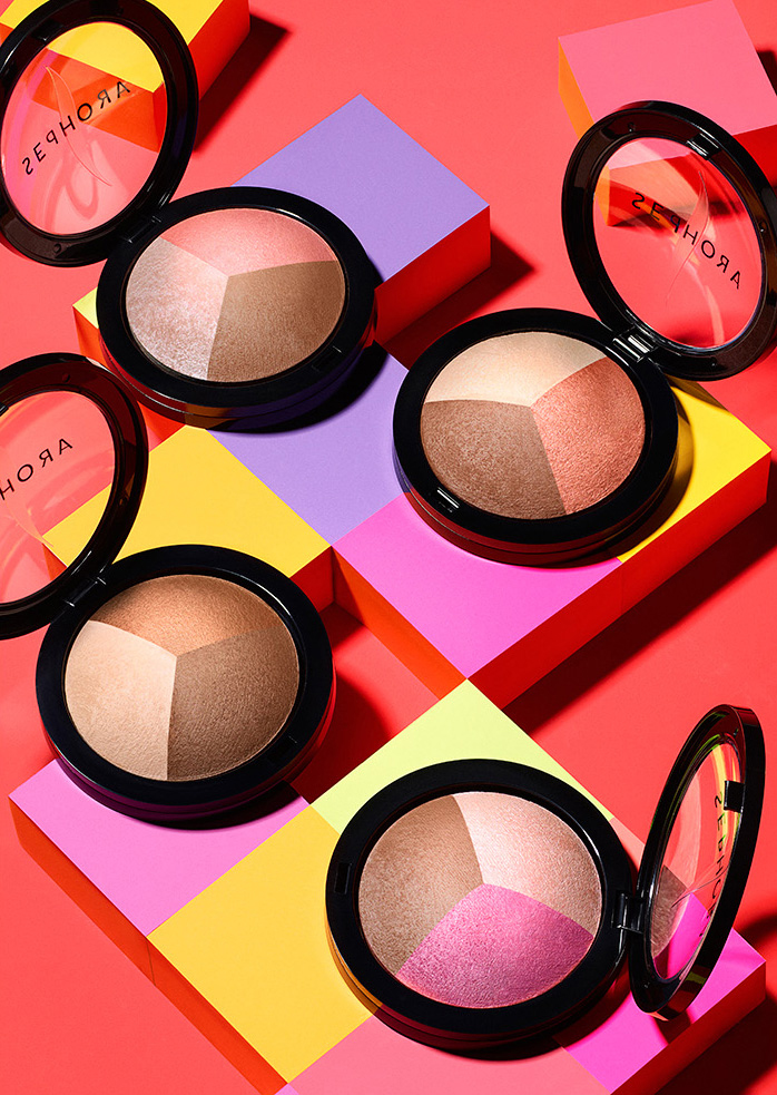 KMA stylist Rachel Haas designs set for photo of colorful highlighters in their packages laying on colorful boxes for Sephora