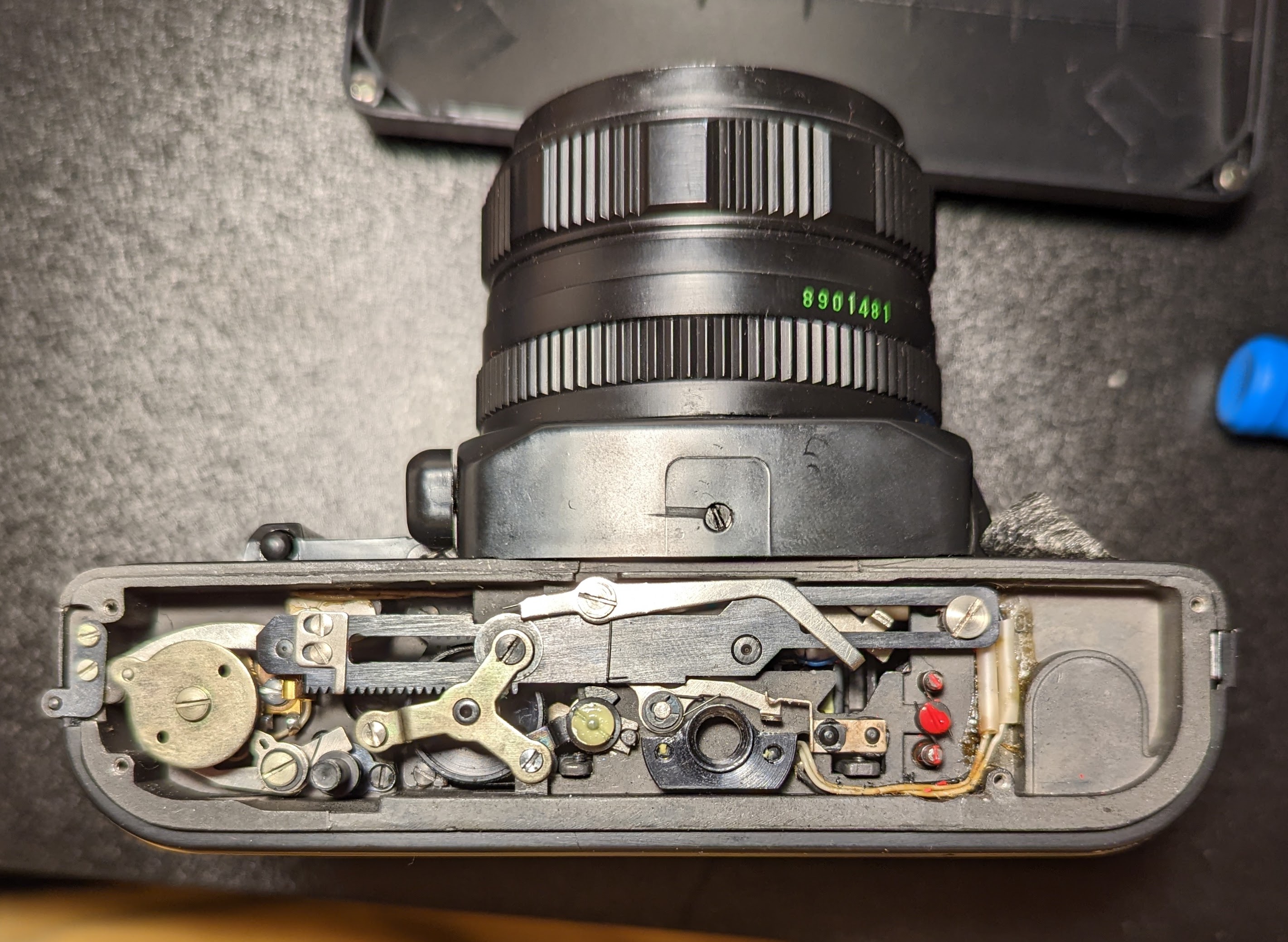 1. View of bottom mechanisms responsible for film and shutter advance.