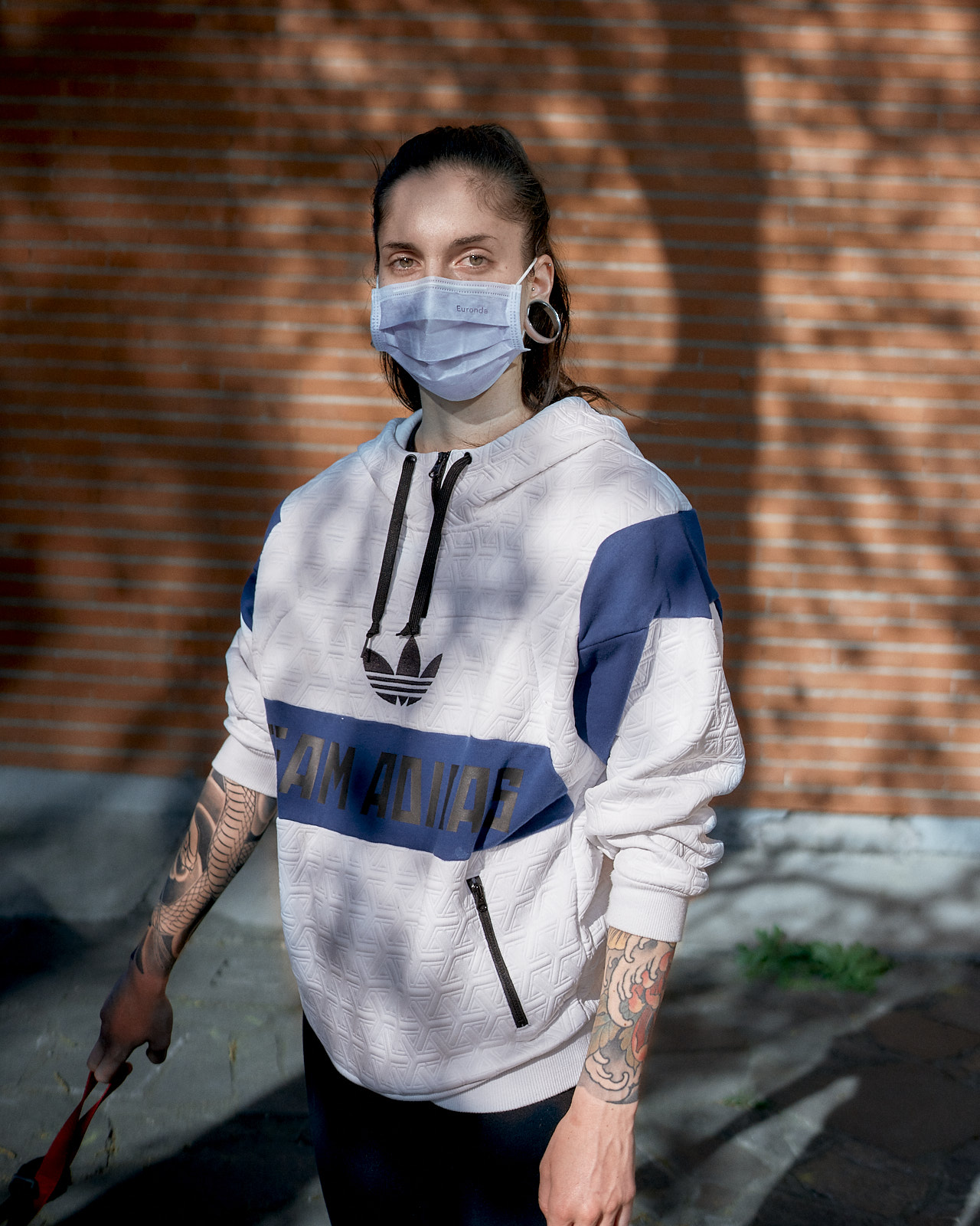 Young Woman Walking Her Dog, Milano, April 2020