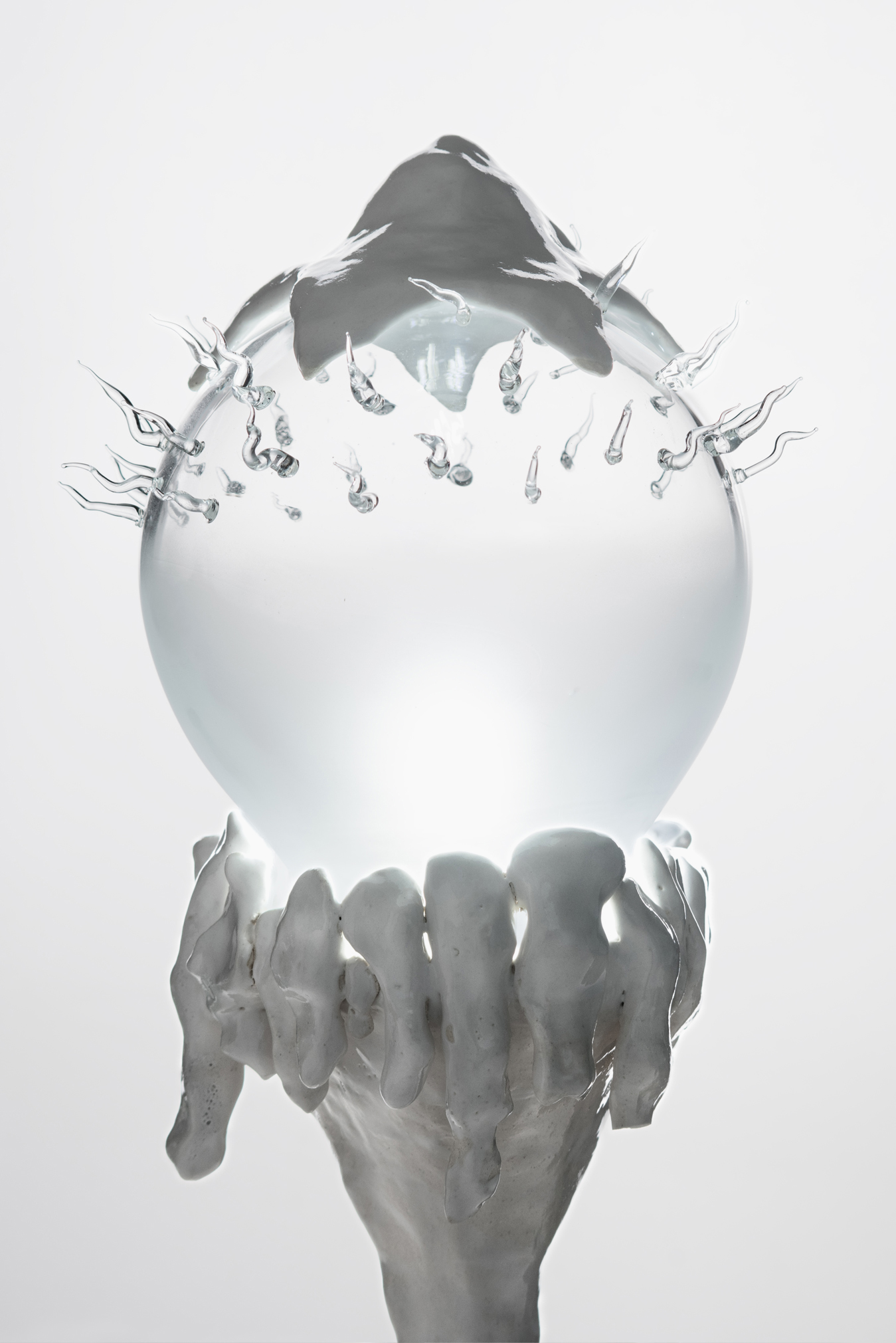 White  Porcelain and Blown Glass Lamp from Plaja Studio in front of white background, product photography, 