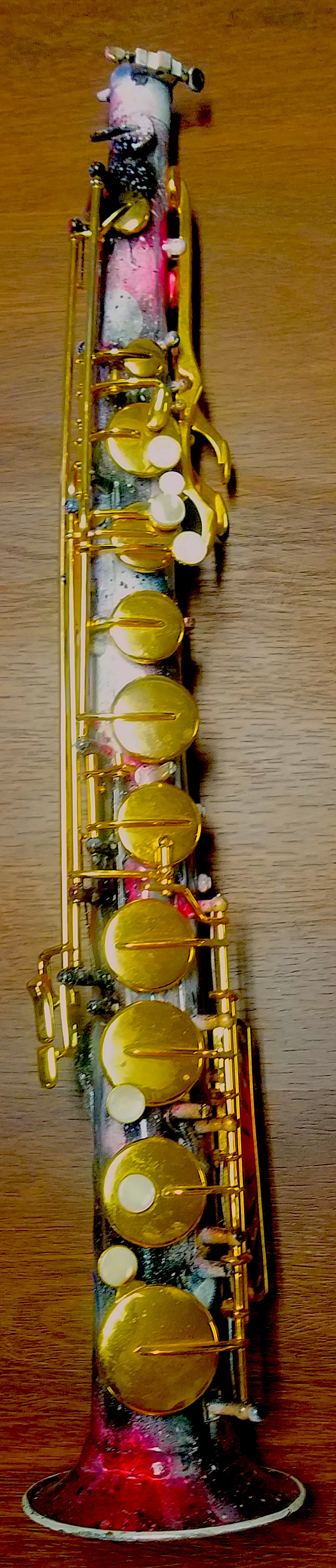 Found a cheap tenor knock off that was warped so I hacked the lower end and made a straight horn with the soft brass, best with big mp or played w/o a mp, played one solo gig with it  2016