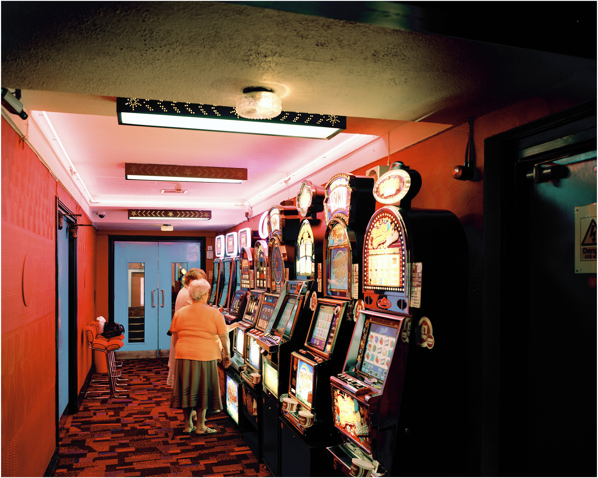Women at the fruit machines. May 2011.