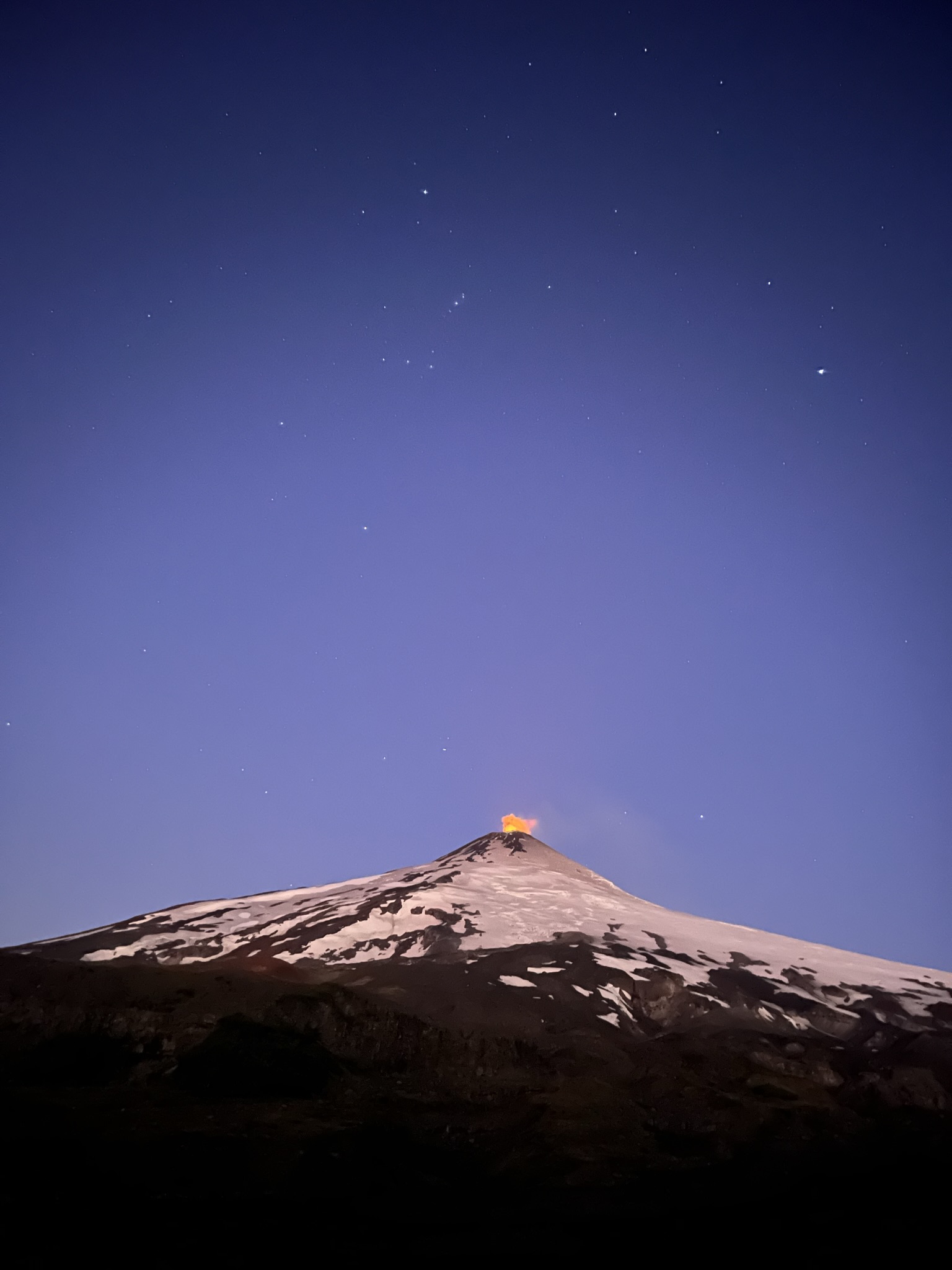 Orion above the active volcano Villarica 