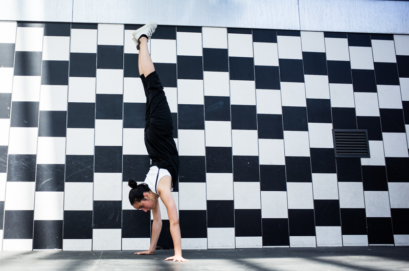 Handstand walk on an angled surface