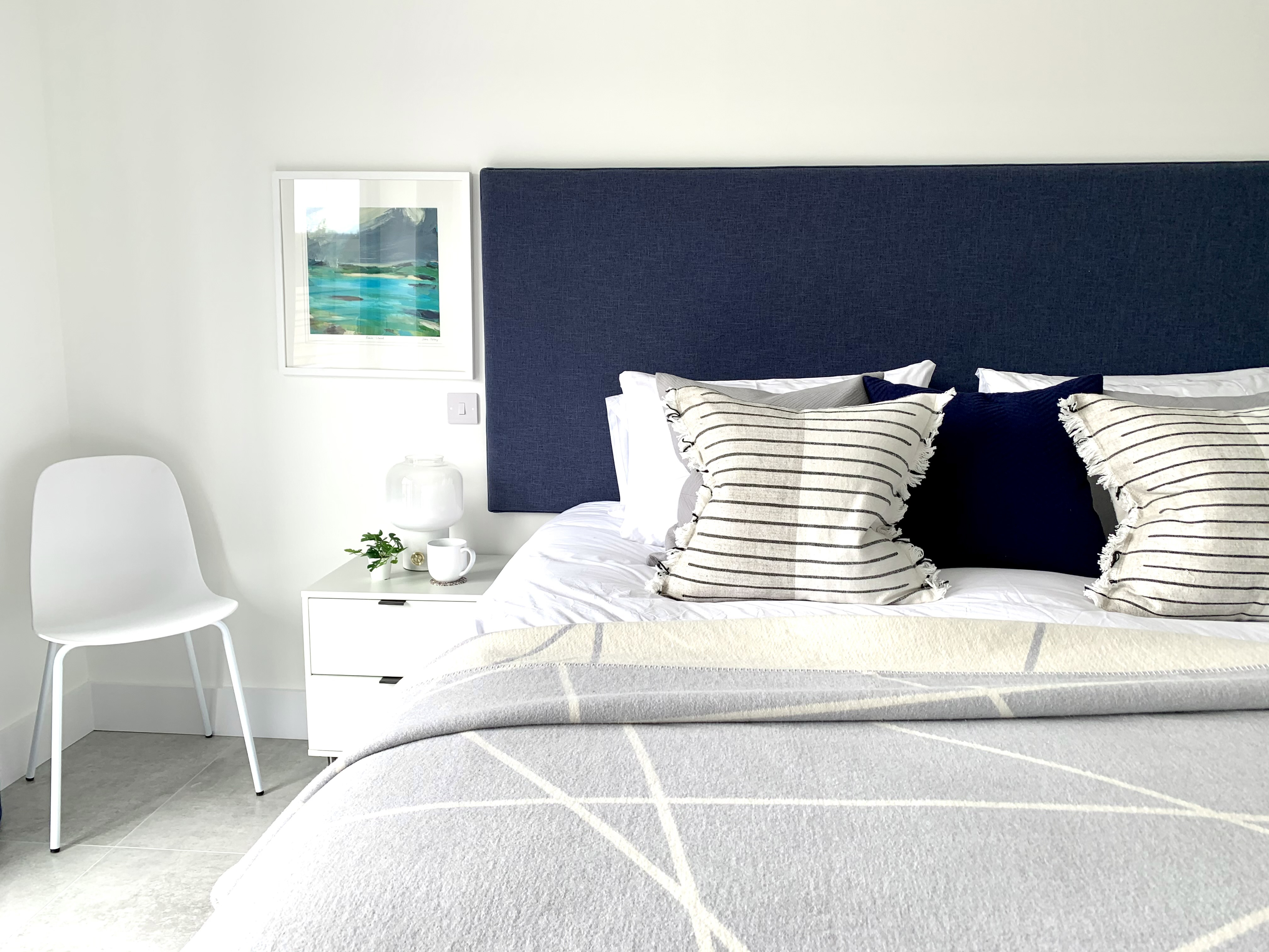 Close up of double bed. Showed as part of slideshow.