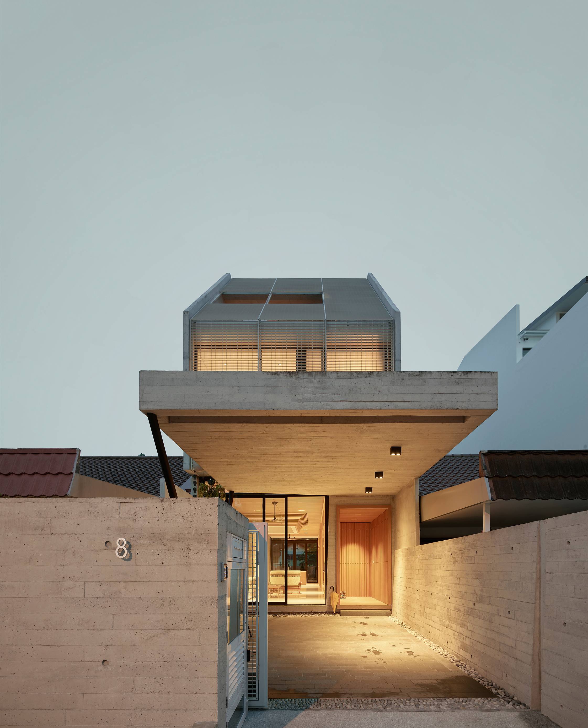 A Porous Continuous Aluminium Screen. A Simple Terrace House, Singapore. Photograph: Kevin Scott, 2017