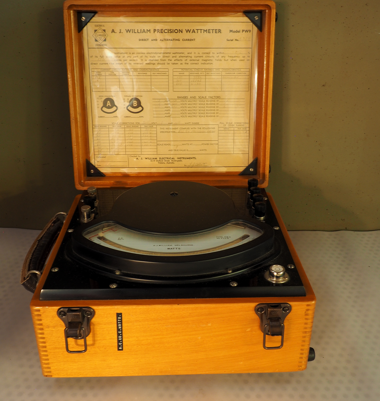 Precision Wattmeter. Model PW9. Serial No: 3358 This instrument is an ironless electodynamic wattmeter. It measures watts!. Printed material includes historical data including the name of the maker (J.J. Abbott), and that it was last calibrated on 28th October 1961. Made in Huntingdale, Victoria. Price: $350