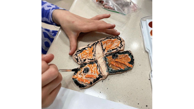 Symmetrical Clay Butterflies 1st Grade Project, Adding color