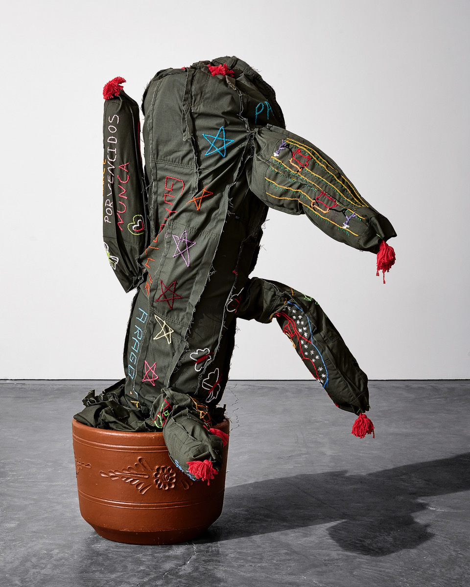 Margarita Cabrera, "Saguaro," 2016, border patrol uniform fabric, copper wire, thread and terra cotta pot, 55.5 x 46 x 17 inches. Photo by Go Sugimoto.