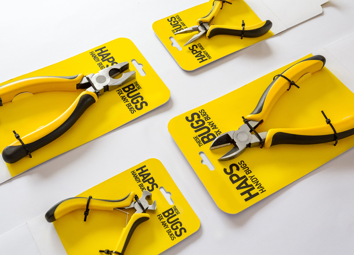Haps Bugs pliers packaging design. Creative packaging. Tools packaging design. Eclectic M Studio.