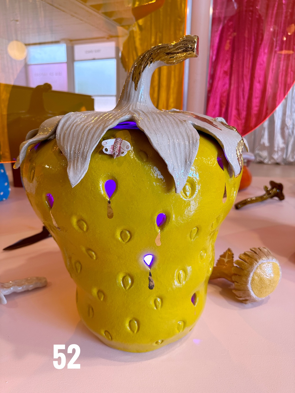 Glowing Strawberry, 2023, Glazed stoneware, gold luster, electrical components $4,000 *c