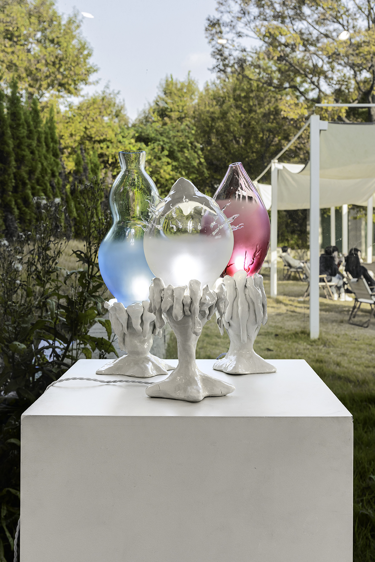 Three lamps made with Porcelain and Blown Glass from Plaja Studio exhibited at Forerium, South Korea