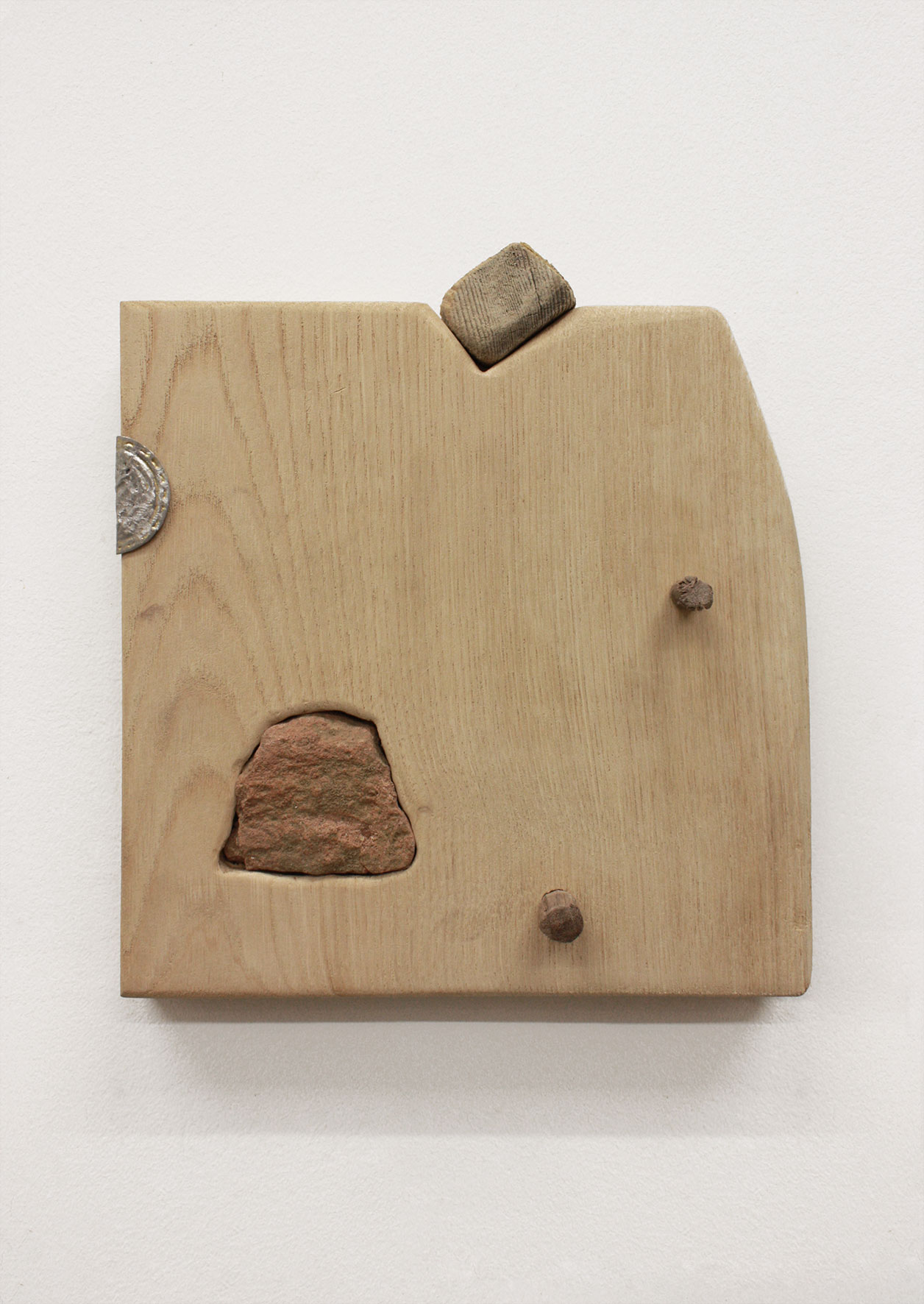 Perils in Leasure, 2018  Yew, sulphur stained Tuff, bottle cap, rudder element, walnut  28 x 25 x 3 cm