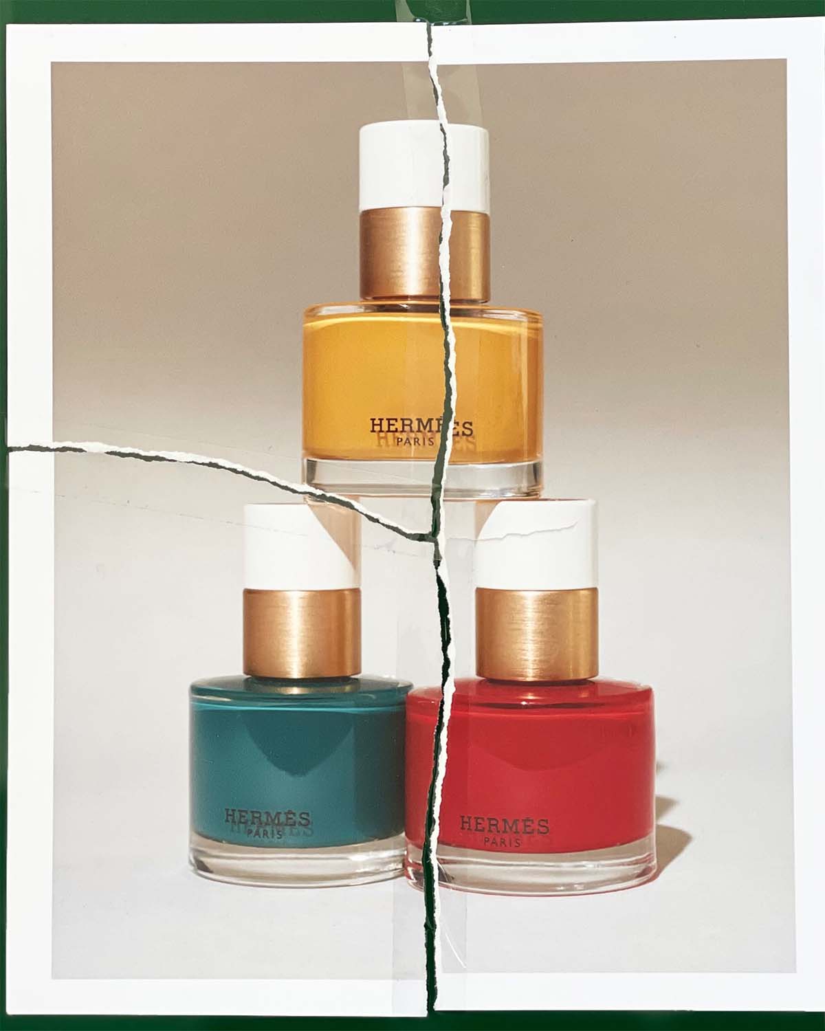 KMA photographer Vincent Gapaillard photographs a pyramid of Hermes nail polish on torn print for Carton Magazine