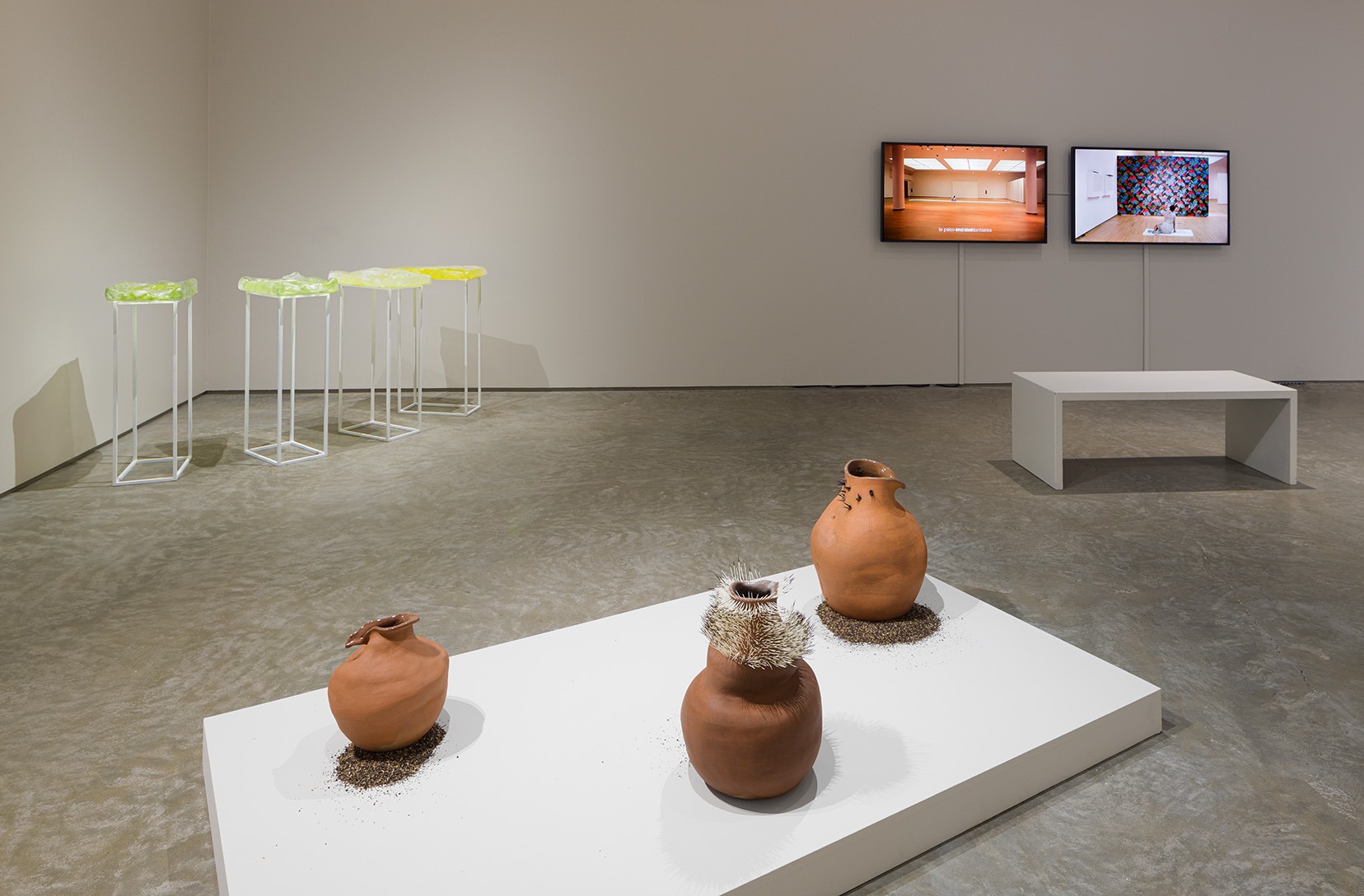 Ani Liu, "Untitled (pumping at work)," 2022. Food grade tubing, liquid pump, air pump, microcontroller, synthetic milk. Variable, mapped to the gallery work desk. Volume of milk equal to amount pumped in a work week. Photo by Etienne Frossard.