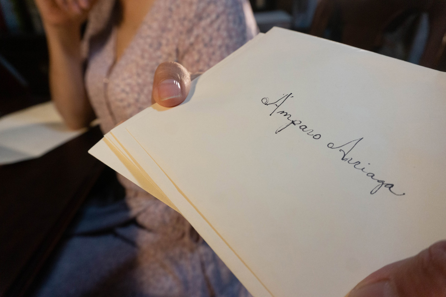 Image 9: Luisa hands the letters to Placido and tells him to make sure they receive the letters and to assure them how sorry she is not being able to say goodbye and that she loves very much.