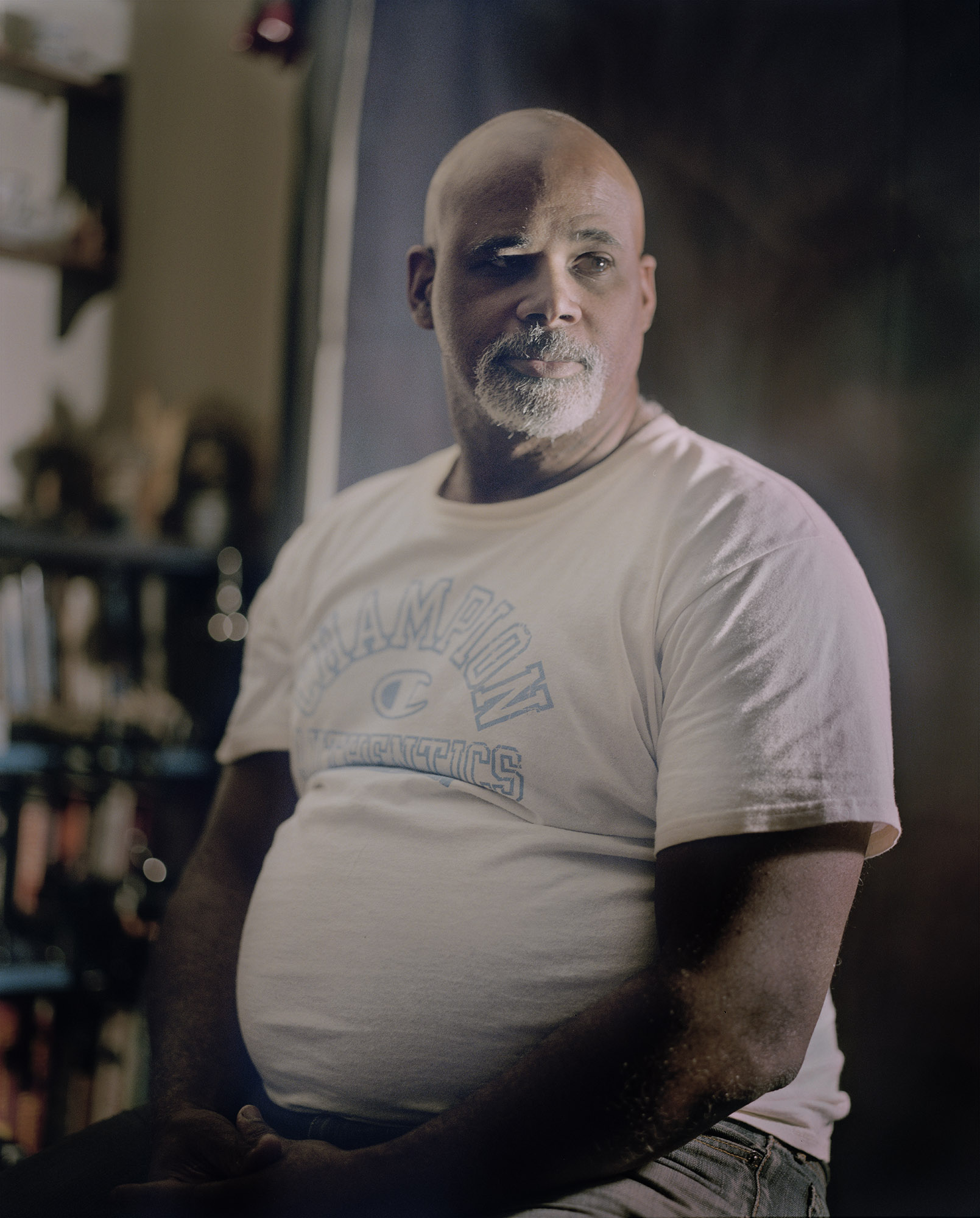 Charles and his wife Liz have lived at 120 Odell Clark place for 15 years. Charles, a photographer, created a home studio in their living room.